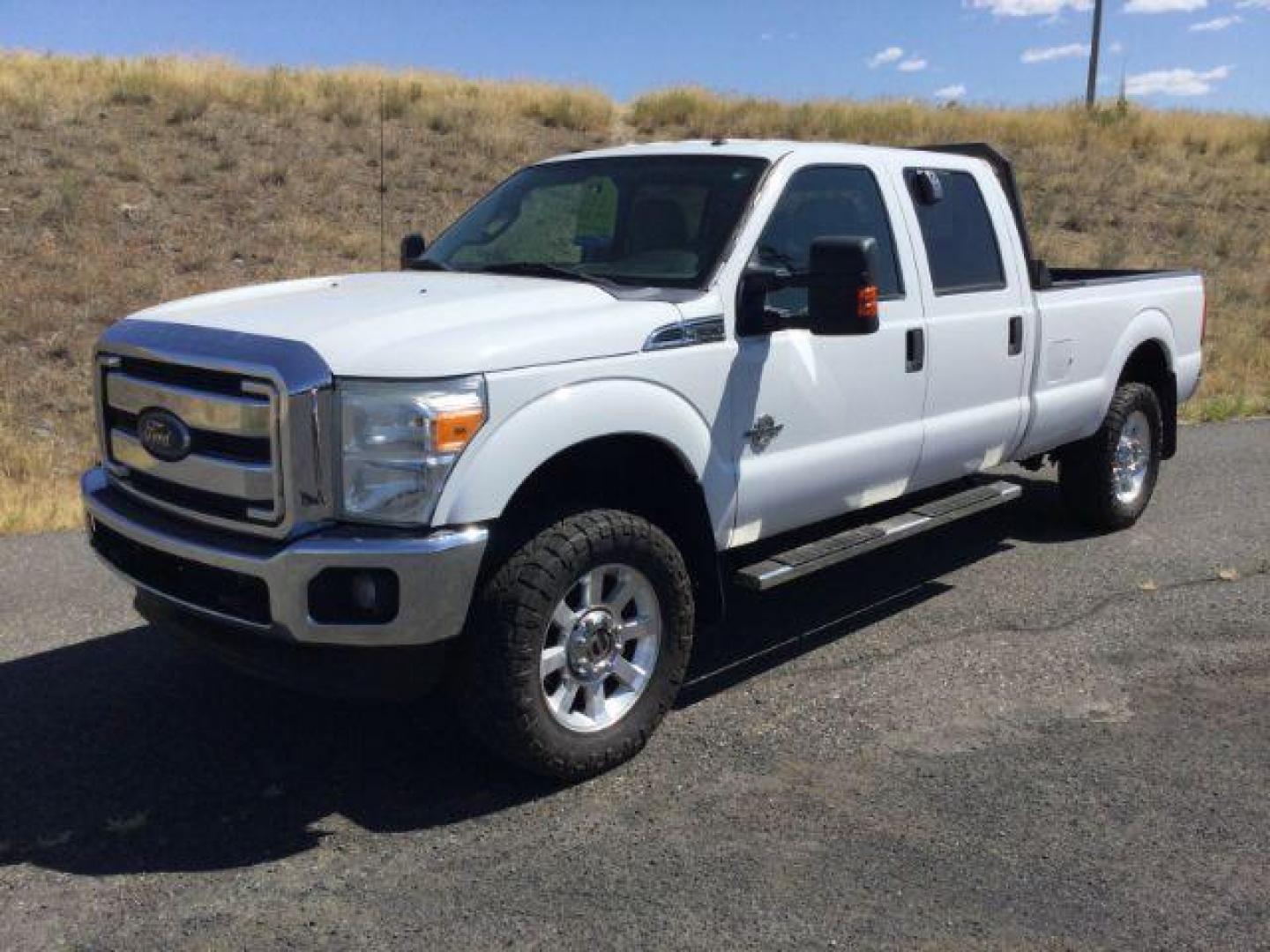 2012 Oxford White Ford F-350 SD CREW CAB PICKUP 4-DR (1FT8W3BT9CE) with an 6.7L V8 OHV 16V DIESEL engine, 6-Speed Automatic transmission, located at 1801 Main Street, Lewiston, 83501, (208) 743-9371, 46.417065, -117.004799 - Photo#0