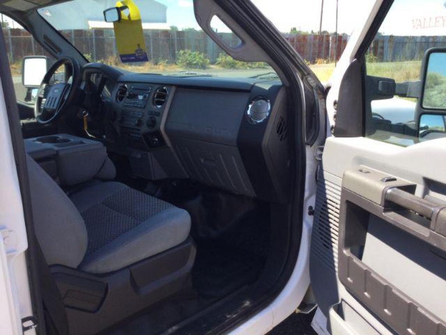 2012 Oxford White Ford F-350 SD CREW CAB PICKUP 4-DR (1FT8W3BT9CE) with an 6.7L V8 OHV 16V DIESEL engine, 6-Speed Automatic transmission, located at 1801 Main Street, Lewiston, 83501, (208) 743-9371, 46.417065, -117.004799 - Photo#14