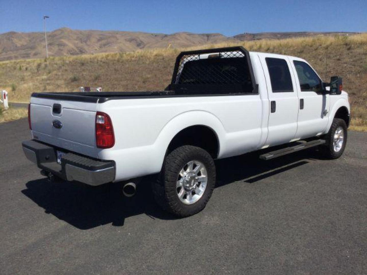 2012 Oxford White Ford F-350 SD CREW CAB PICKUP 4-DR (1FT8W3BT9CE) with an 6.7L V8 OHV 16V DIESEL engine, 6-Speed Automatic transmission, located at 1801 Main Street, Lewiston, 83501, (208) 743-9371, 46.417065, -117.004799 - Photo#17