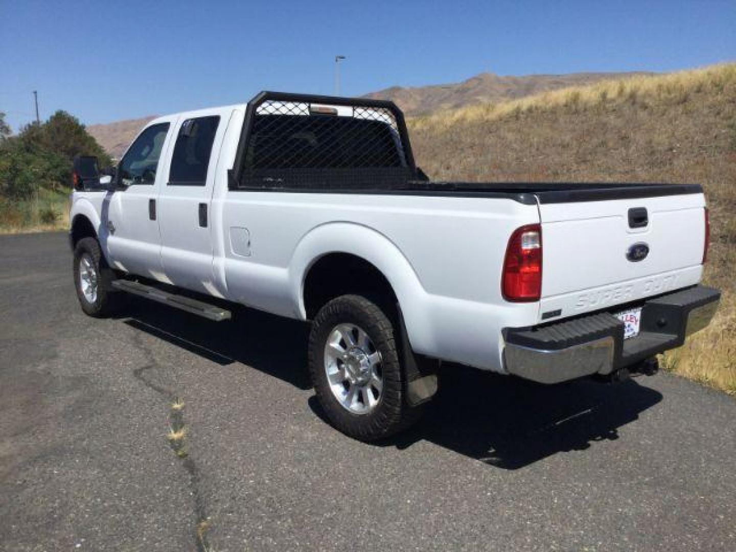 2012 Oxford White Ford F-350 SD CREW CAB PICKUP 4-DR (1FT8W3BT9CE) with an 6.7L V8 OHV 16V DIESEL engine, 6-Speed Automatic transmission, located at 1801 Main Street, Lewiston, 83501, (208) 743-9371, 46.417065, -117.004799 - Photo#2