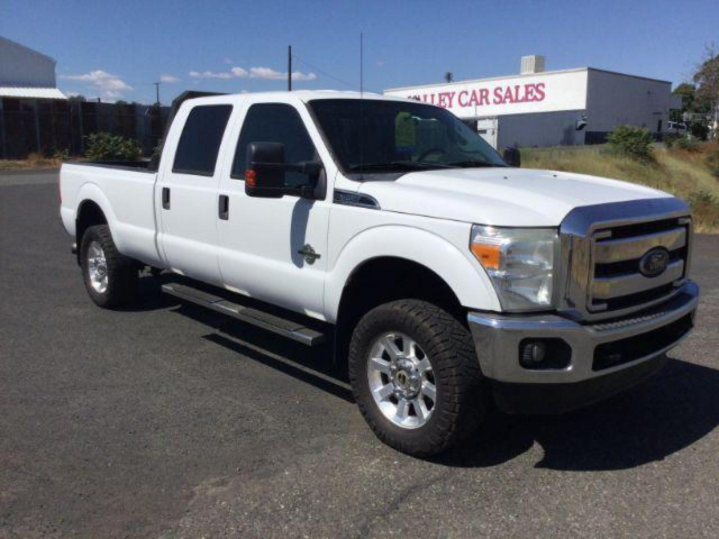 2012 Oxford White Ford F-350 SD CREW CAB PICKUP 4-DR (1FT8W3BT9CE) with an 6.7L V8 OHV 16V DIESEL engine, 6-Speed Automatic transmission, located at 1801 Main Street, Lewiston, 83501, (208) 743-9371, 46.417065, -117.004799 - Photo#8