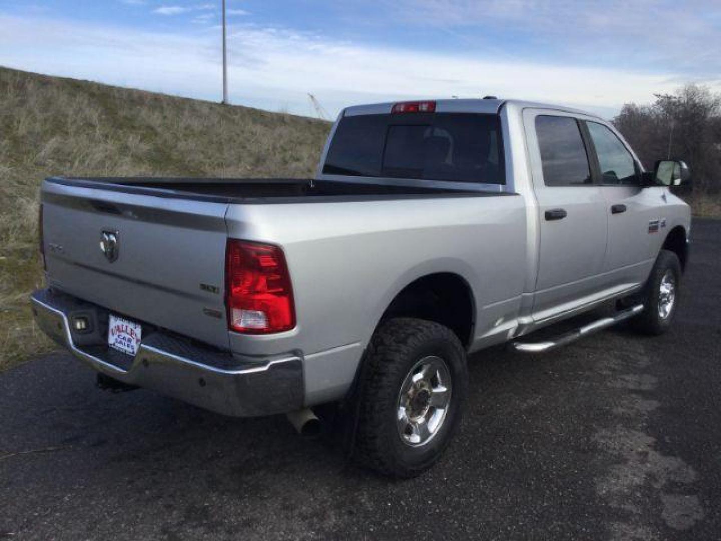 2012 Bright Silver Metallic /Dark Slate/Medium Graystone Cloth Interior RAM 3500 SLT Crew Cab SWB 4WD (3C63D3DL6CG) with an 6.7L L6 OHV 24V TURBO DIESEL engine, 6-Speed Automatic transmission, located at 1801 Main Street, Lewiston, 83501, (208) 743-9371, 46.417065, -117.004799 - Photo#13