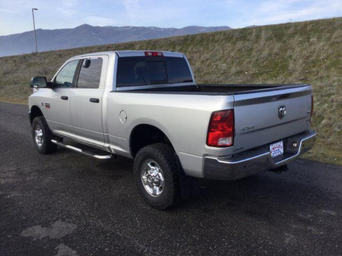 2012 Bright Silver Metallic /Dark Slate/Medium Graystone Cloth Interior RAM 3500 SLT Crew Cab SWB 4WD (3C63D3DL6CG) with an 6.7L L6 OHV 24V TURBO DIESEL engine, 6-Speed Automatic transmission, located at 1801 Main Street, Lewiston, 83501, (208) 743-9371, 46.417065, -117.004799 - Photo#2