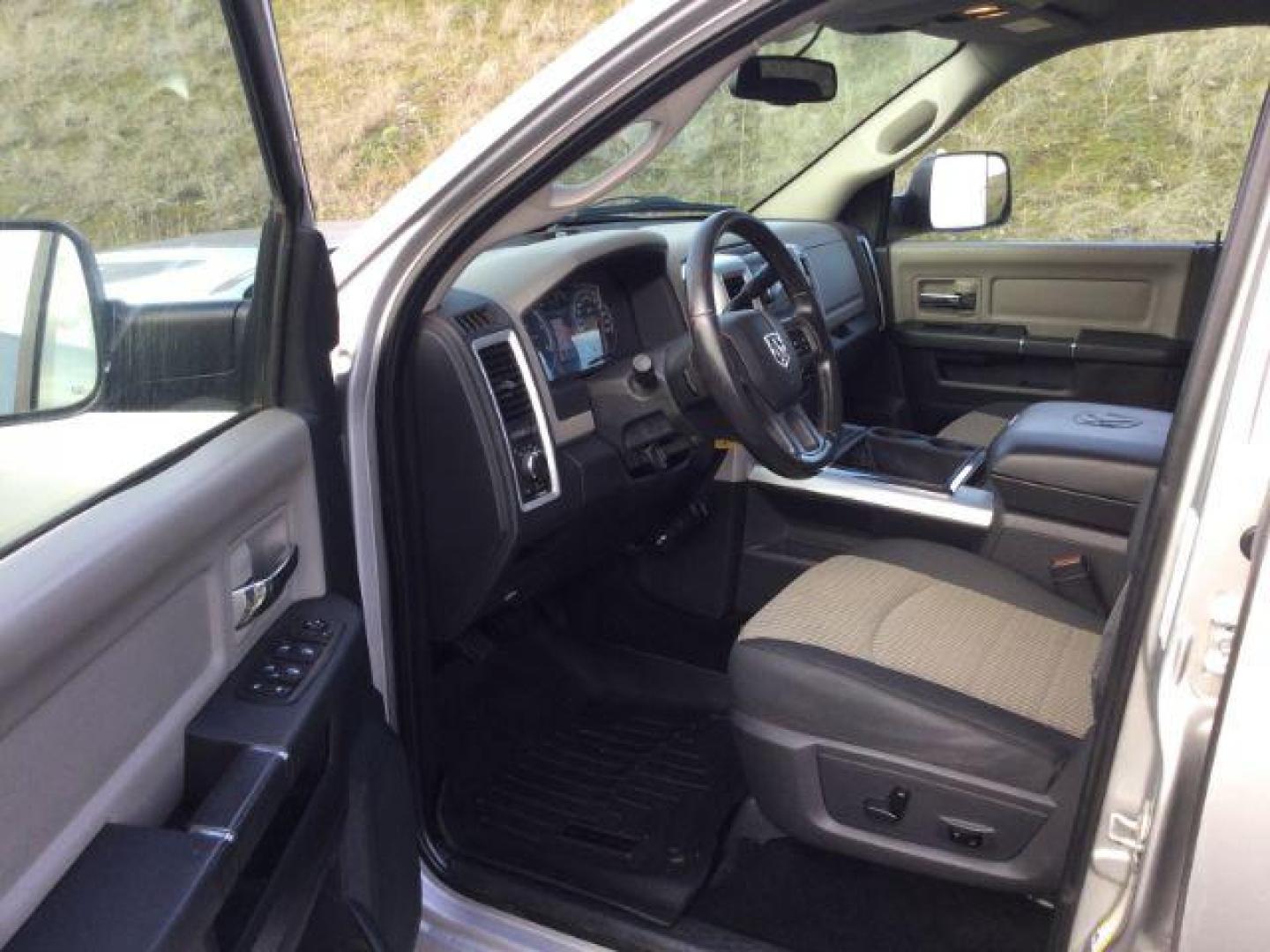 2012 Bright Silver Metallic /Dark Slate/Medium Graystone Cloth Interior RAM 3500 SLT Crew Cab SWB 4WD (3C63D3DL6CG) with an 6.7L L6 OHV 24V TURBO DIESEL engine, 6-Speed Automatic transmission, located at 1801 Main Street, Lewiston, 83501, (208) 743-9371, 46.417065, -117.004799 - Photo#3