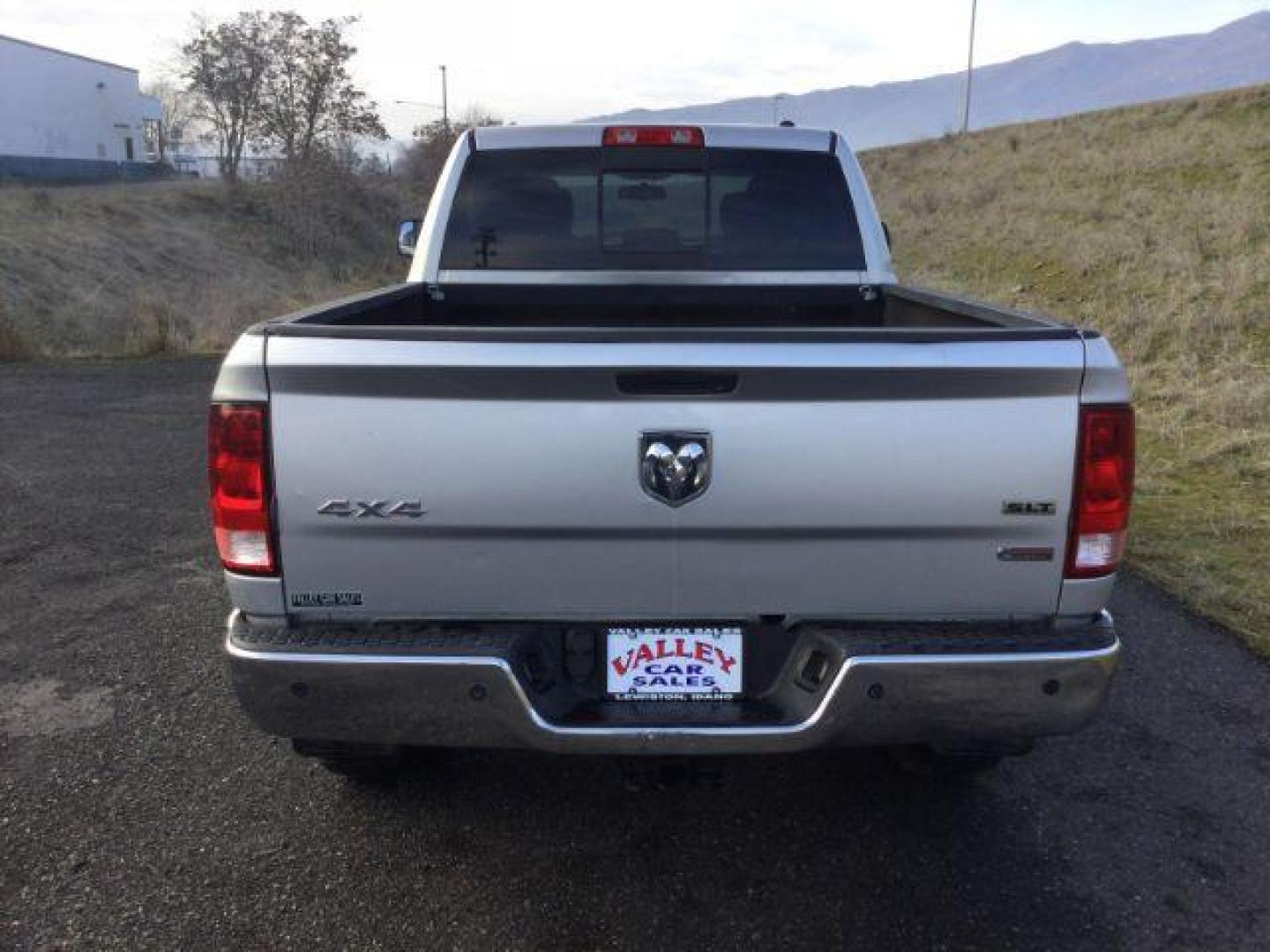 2012 Bright Silver Metallic /Dark Slate/Medium Graystone Cloth Interior RAM 3500 SLT Crew Cab SWB 4WD (3C63D3DL6CG) with an 6.7L L6 OHV 24V TURBO DIESEL engine, 6-Speed Automatic transmission, located at 1801 Main Street, Lewiston, 83501, (208) 743-9371, 46.417065, -117.004799 - Photo#7