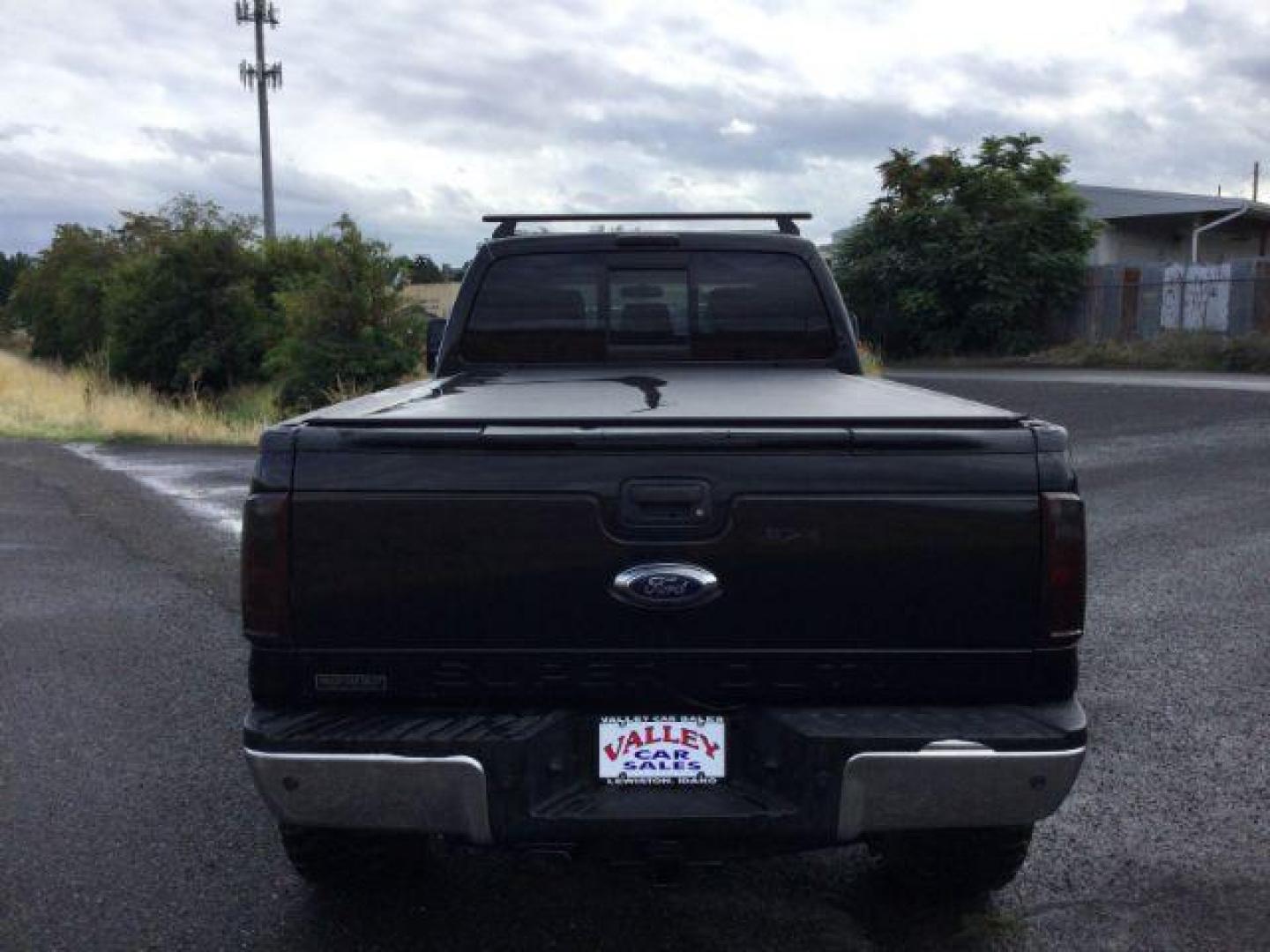 2014 Tuxedo Black Metallic /Black Ford F-350 SD Lariat Crew Cab 4WD (1FT8W3BT8EE) with an 6.7L V8 OHV 16V DIESEL engine, 6-Speed Automatic transmission, located at 1801 Main Street, Lewiston, 83501, (208) 743-9371, 46.417065, -117.004799 - Photo#12