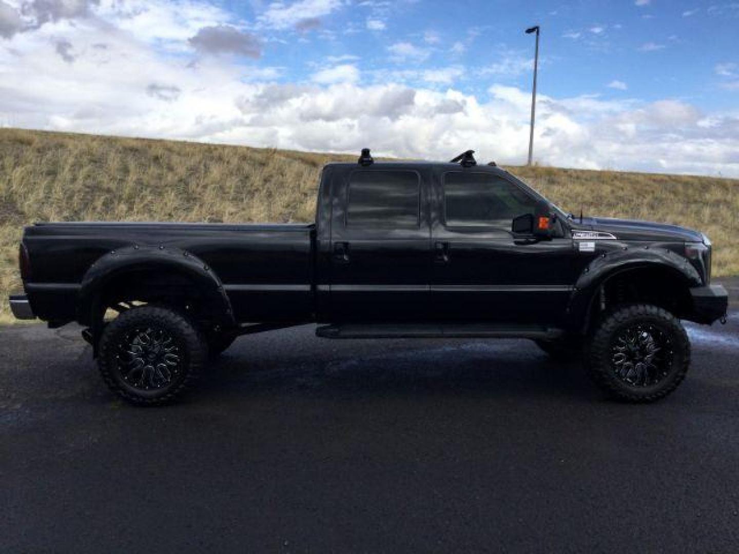 2014 Tuxedo Black Metallic /Black Ford F-350 SD Lariat Crew Cab 4WD (1FT8W3BT8EE) with an 6.7L V8 OHV 16V DIESEL engine, 6-Speed Automatic transmission, located at 1801 Main Street, Lewiston, 83501, (208) 743-9371, 46.417065, -117.004799 - Photo#15