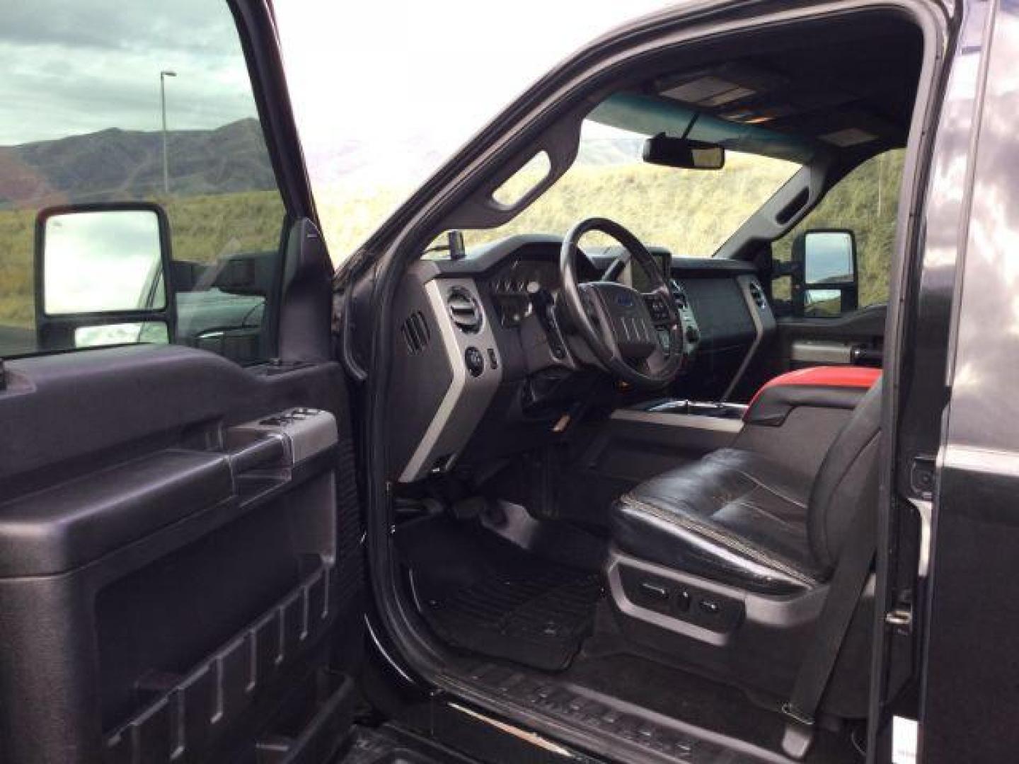 2014 Tuxedo Black Metallic /Black Ford F-350 SD Lariat Crew Cab 4WD (1FT8W3BT8EE) with an 6.7L V8 OHV 16V DIESEL engine, 6-Speed Automatic transmission, located at 1801 Main Street, Lewiston, 83501, (208) 743-9371, 46.417065, -117.004799 - Photo#3