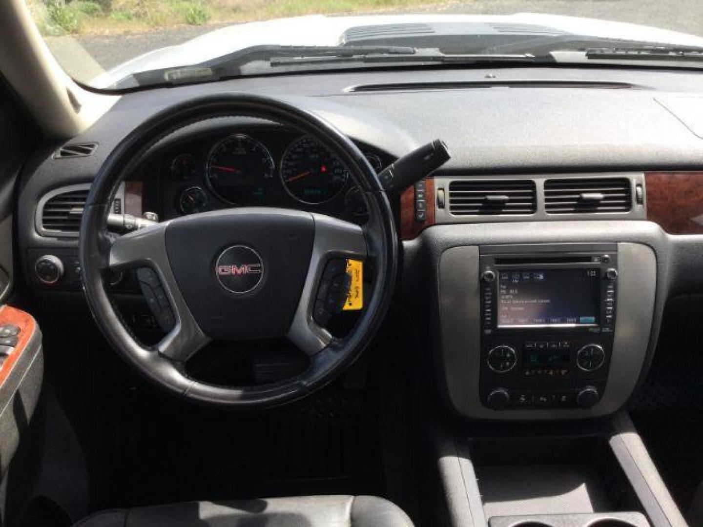 2014 Quicksilver Metallic /Ebony GMC Sierra 2500HD SLT Crew Cab 4WD (1GT121EG6EF) with an 6.0L V8 OHV 16V FFV engine, 6-Speed Automatic transmission, located at 1801 Main Street, Lewiston, 83501, (208) 743-9371, 46.417065, -117.004799 - Photo#6