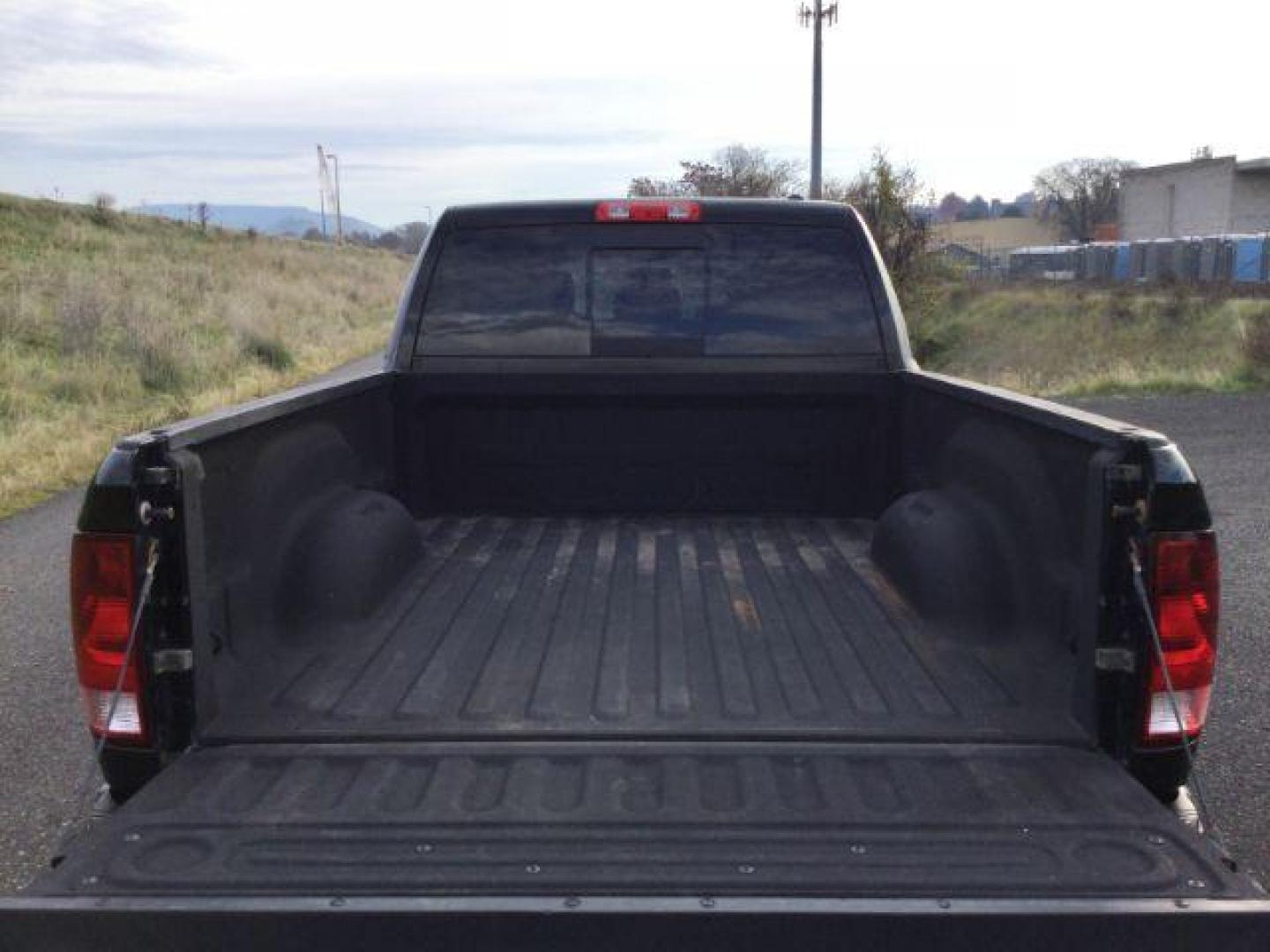 2012 Black RAM 3500 Laramie Longhorn Edition Mega Cab 4WD (3C63D3NL7CG) with an 6.7L L6 OHV 24V TURBO DIESEL engine, 6-Speed Automatic transmission, located at 1801 Main Street, Lewiston, 83501, (208) 743-9371, 46.417065, -117.004799 - Photo#15