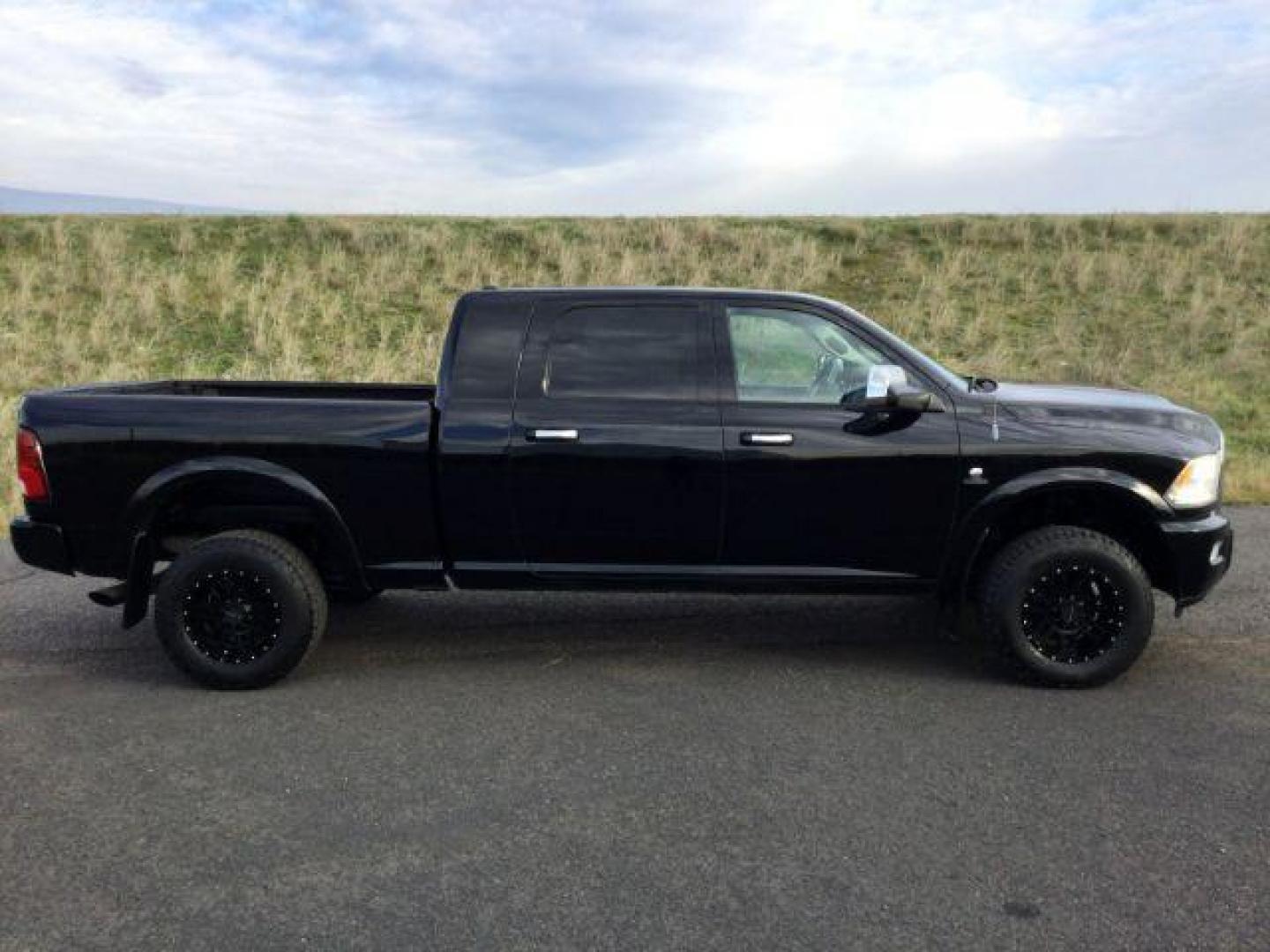 2012 Black RAM 3500 Laramie Longhorn Edition Mega Cab 4WD (3C63D3NL7CG) with an 6.7L L6 OHV 24V TURBO DIESEL engine, 6-Speed Automatic transmission, located at 1801 Main Street, Lewiston, 83501, (208) 743-9371, 46.417065, -117.004799 - Photo#17