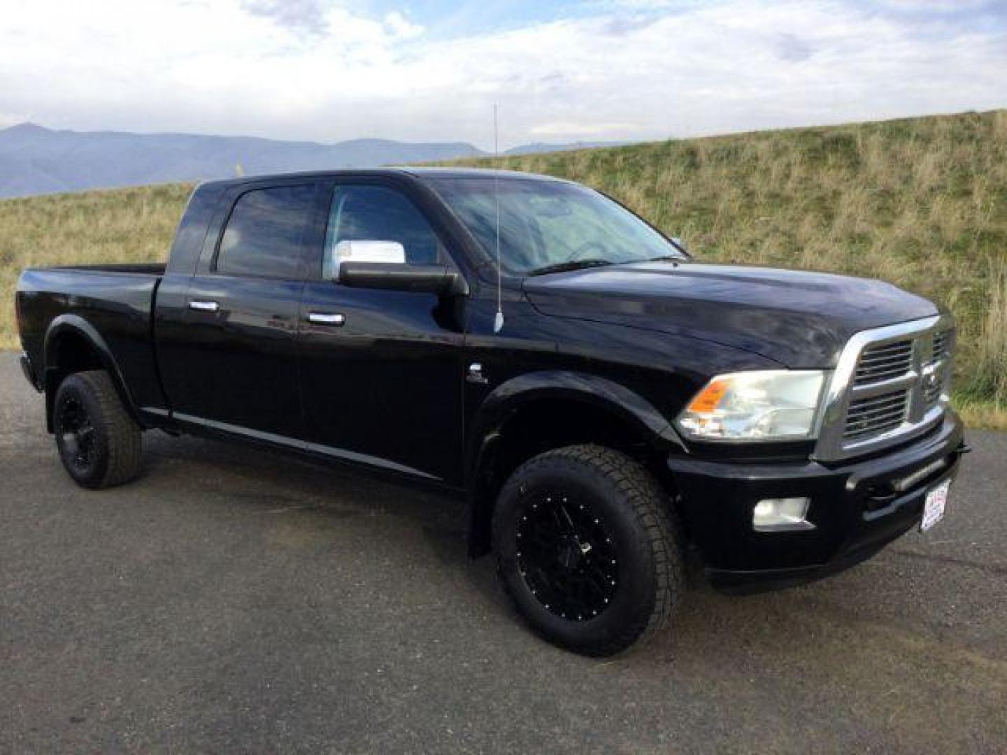 2012 Black RAM 3500 Laramie Longhorn Edition Mega Cab 4WD (3C63D3NL7CG) with an 6.7L L6 OHV 24V TURBO DIESEL engine, 6-Speed Automatic transmission, located at 1801 Main Street, Lewiston, 83501, (208) 743-9371, 46.417065, -117.004799 - Photo#18