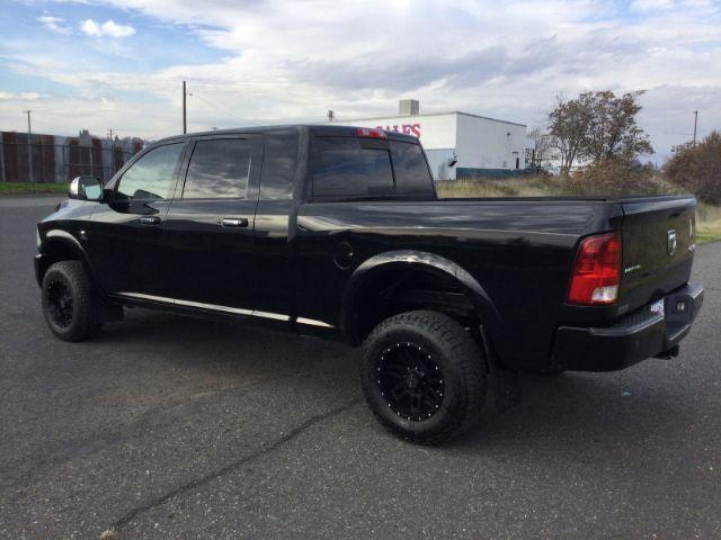 2012 Black RAM 3500 Laramie Longhorn Edition Mega Cab 4WD (3C63D3NL7CG) with an 6.7L L6 OHV 24V TURBO DIESEL engine, 6-Speed Automatic transmission, located at 1801 Main Street, Lewiston, 83501, (208) 743-9371, 46.417065, -117.004799 - Photo#2