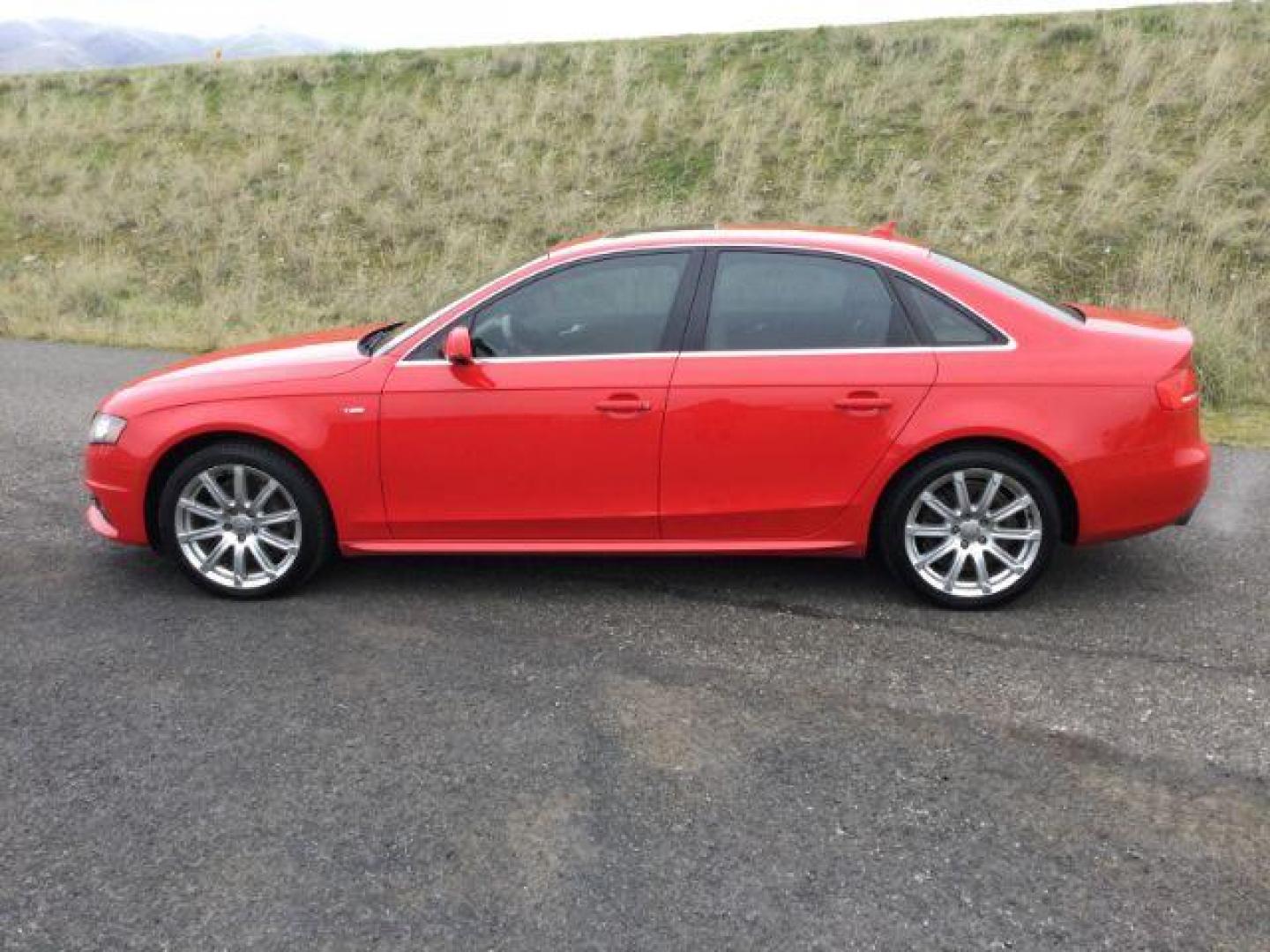 2012 Brilliant Red /Cardamom Beige Leather Interior Audi A4 2.0T Sedan quattro Tiptronic (WAUFFAFL5CN) with an 2.0L L4 DOHC 16V TURBO engine, 6-Speed Automatic transmission, located at 1801 Main Street, Lewiston, 83501, (208) 743-9371, 46.417065, -117.004799 - Photo#1