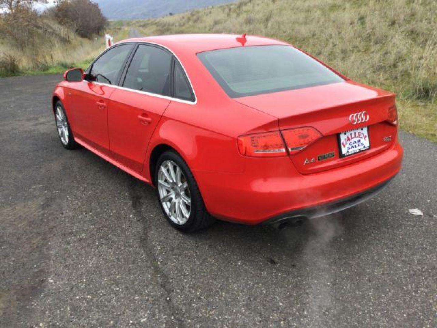 2012 Brilliant Red /Cardamom Beige Leather Interior Audi A4 2.0T Sedan quattro Tiptronic (WAUFFAFL5CN) with an 2.0L L4 DOHC 16V TURBO engine, 6-Speed Automatic transmission, located at 1801 Main Street, Lewiston, 83501, (208) 743-9371, 46.417065, -117.004799 - Photo#2