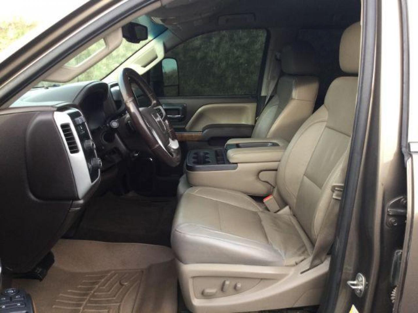 2015 Bronze Alloy Metallic /Cocoa/Dune GMC Sierra 3500HD SLT Crew Cab 4WD (1GT423E82FF) with an 6.6L V8 OHV 16 DIESEL engine, 6-Speed Automatic transmission, located at 1801 Main Street, Lewiston, 83501, (208) 743-9371, 46.417065, -117.004799 - Photo#4