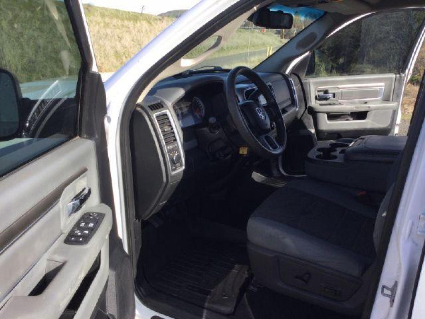 2015 Bright White Clear Coat /Black/Diesel Gray, cloth RAM 3500 SLT Crew Cab LWB 4WD (3C63R3HL2FG) with an 6.7L L6 OHV 24V TURBO DIESEL engine, 6-Speed Automatic transmission, located at 1801 Main Street, Lewiston, 83501, (208) 743-9371, 46.417065, -117.004799 - Photo#3