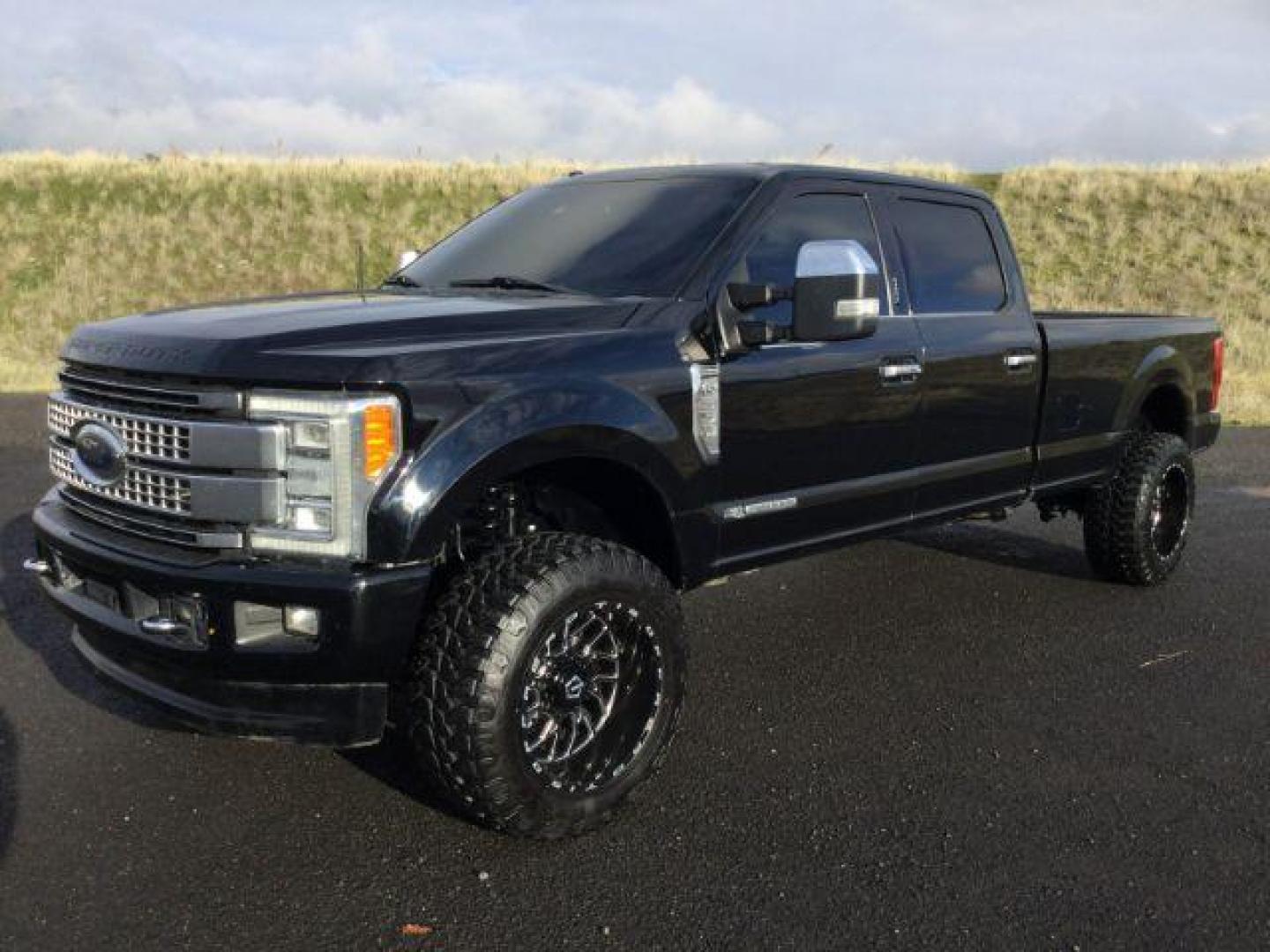 2018 Shadow Black /Black, leather Ford F-350 SD Platinum Crew Cab Long Bed 4WD (1FT8W3BT3JE) with an 6.7L V8 OHV 16V DIESEL engine, 6-Speed Automatic transmission, located at 1801 Main Street, Lewiston, 83501, (208) 743-9371, 46.417065, -117.004799 - Photo#0