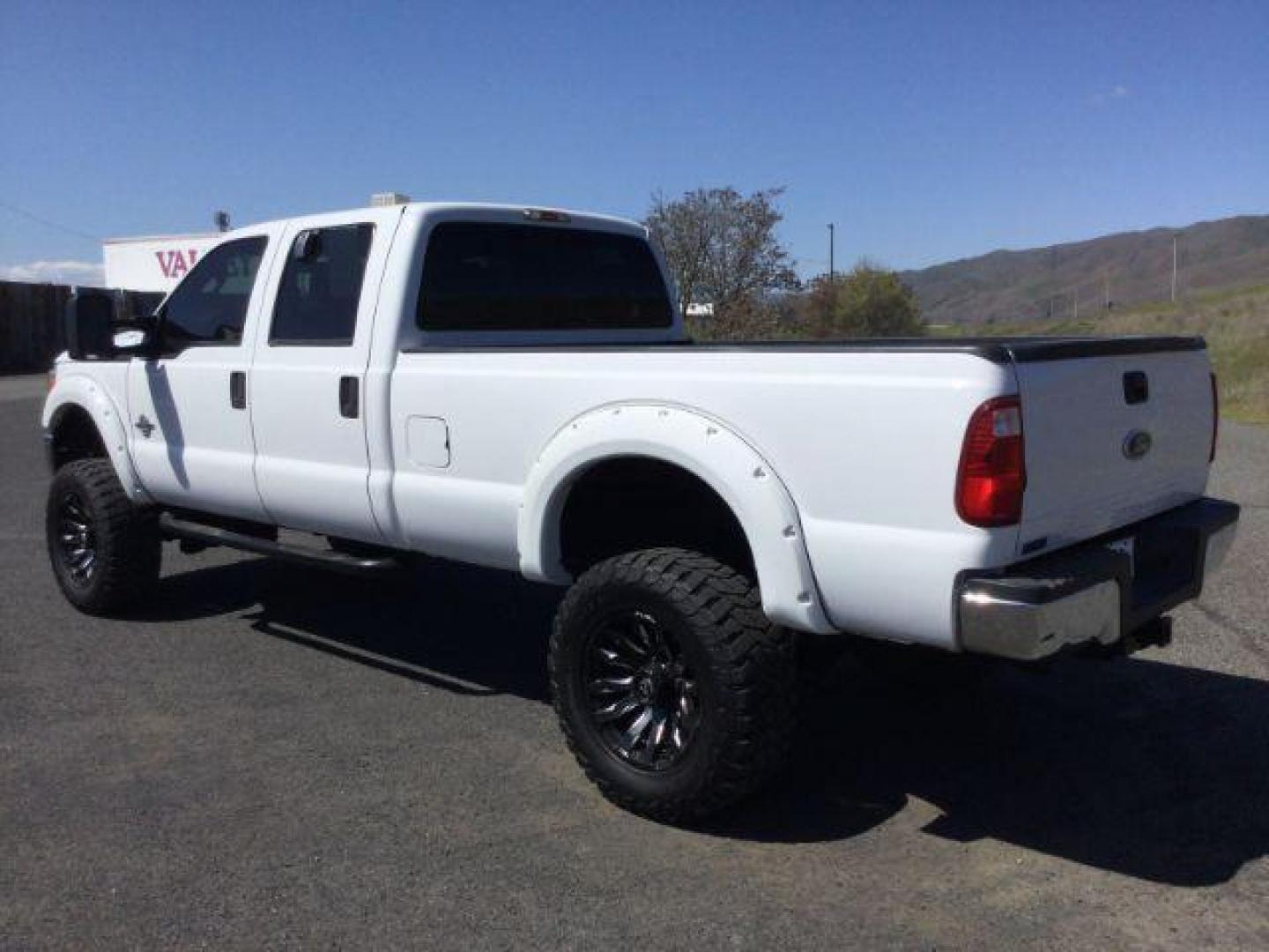 2012 Oxford White /Steel Cloth Interior Ford F-350 SD XL Crew Cab Long Bed 4WD (1FT8W3BT0CE) with an 6.7L V8 OHV 16V DIESEL engine, 6-Speed Automatic transmission, located at 1801 Main Street, Lewiston, 83501, (208) 743-9371, 46.417065, -117.004799 - Photo#2