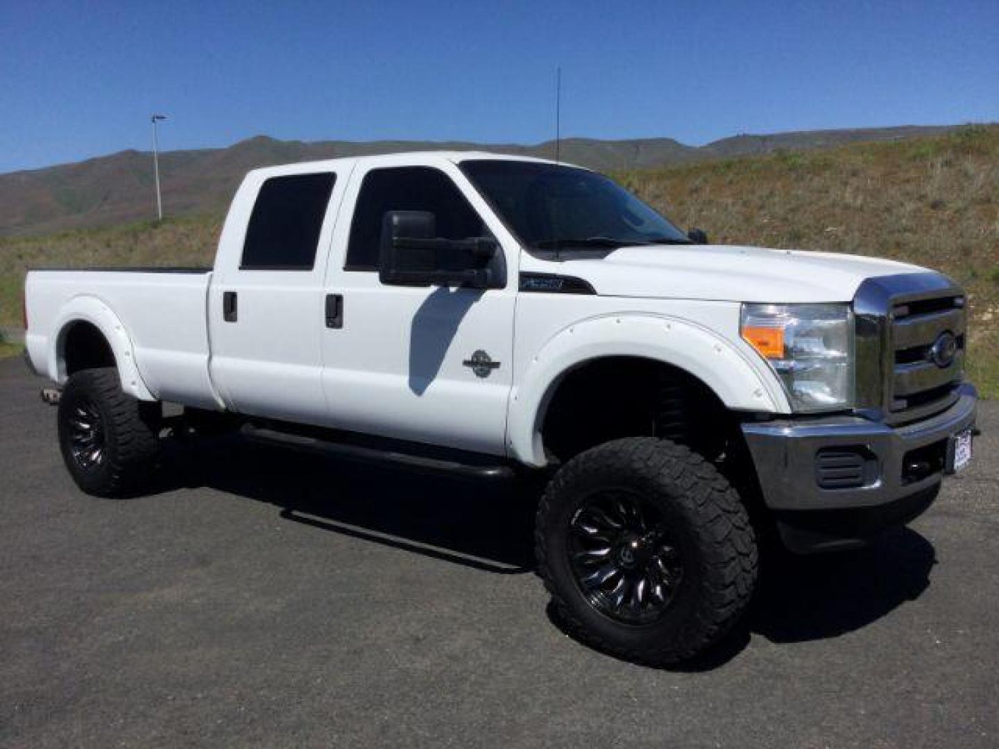 2012 Oxford White /Steel Cloth Interior Ford F-350 SD XL Crew Cab Long Bed 4WD (1FT8W3BT0CE) with an 6.7L V8 OHV 16V DIESEL engine, 6-Speed Automatic transmission, located at 1801 Main Street, Lewiston, 83501, (208) 743-9371, 46.417065, -117.004799 - Photo#6