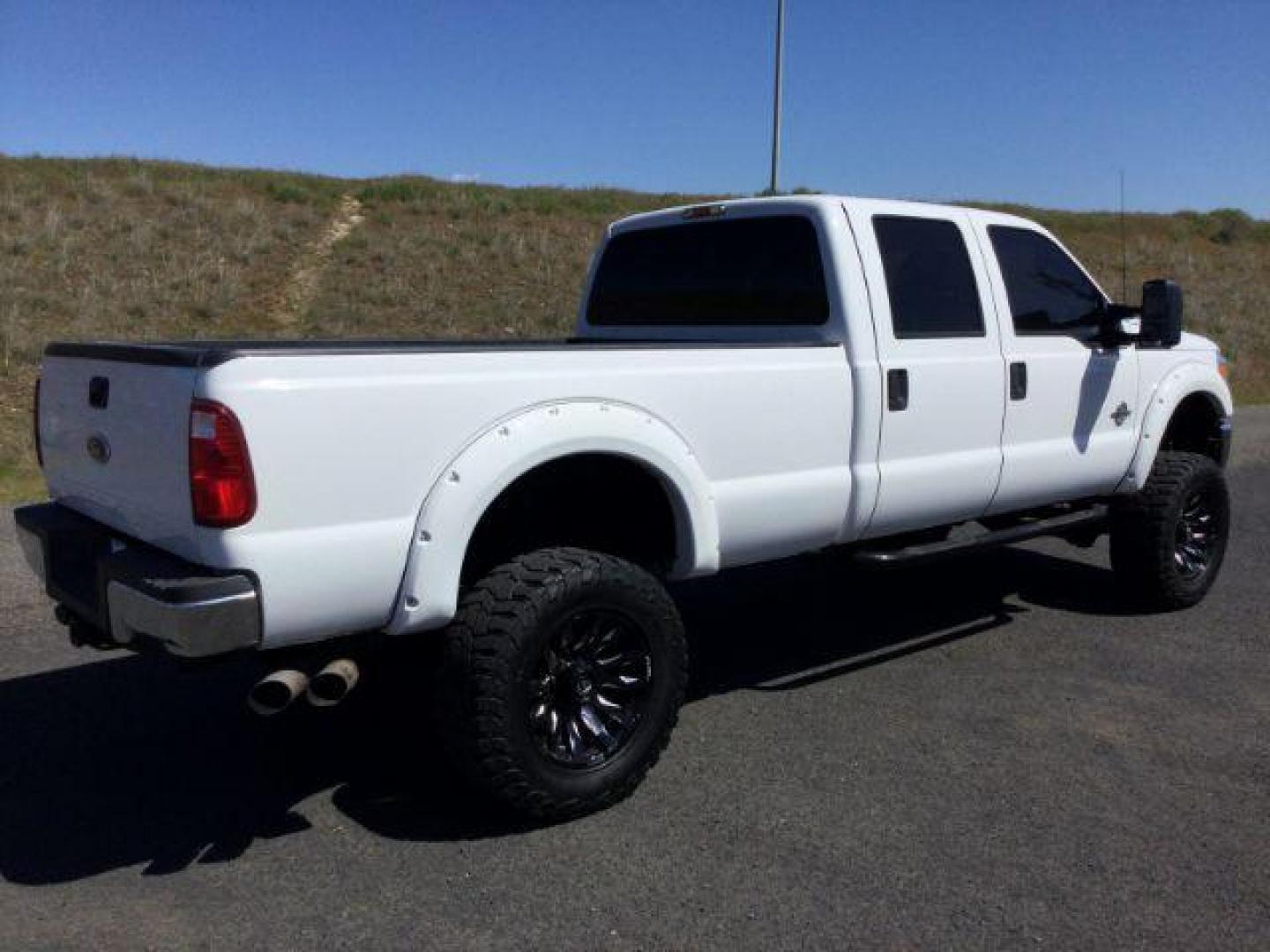 2012 Oxford White /Steel Cloth Interior Ford F-350 SD XL Crew Cab Long Bed 4WD (1FT8W3BT0CE) with an 6.7L V8 OHV 16V DIESEL engine, 6-Speed Automatic transmission, located at 1801 Main Street, Lewiston, 83501, (208) 743-9371, 46.417065, -117.004799 - Photo#8