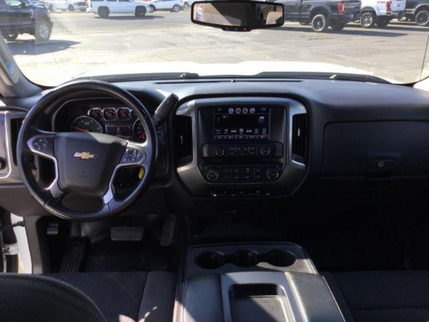 2016 Summit White /Jet Black, cloth Chevrolet Silverado 2500HD LT Crew Cab Long Box 4WD (1GC1KVE85GF) with an 6.6L V8 OHV 32V TURBO DIESEL engine, 6-Speed Automatic transmission, located at 1801 Main Street, Lewiston, 83501, (208) 743-9371, 46.417065, -117.004799 - Photo#5