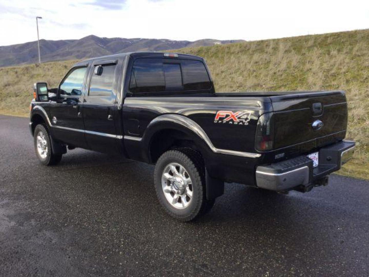 2016 BLACK Ford F-350 SD Lariat Crew Cab 4WD (1FT8W3BTXGE) with an 6.7L V8 OHV 16V DIESEL engine, 6-Speed Automatic transmission, located at 1801 Main Street, Lewiston, 83501, (208) 743-9371, 46.417065, -117.004799 - Photo#2