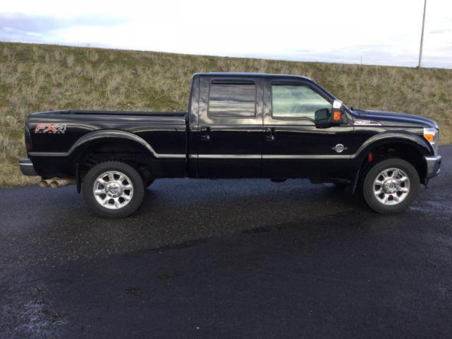 2016 BLACK Ford F-350 SD Lariat Crew Cab 4WD (1FT8W3BTXGE) with an 6.7L V8 OHV 16V DIESEL engine, 6-Speed Automatic transmission, located at 1801 Main Street, Lewiston, 83501, (208) 743-9371, 46.417065, -117.004799 - Photo#14