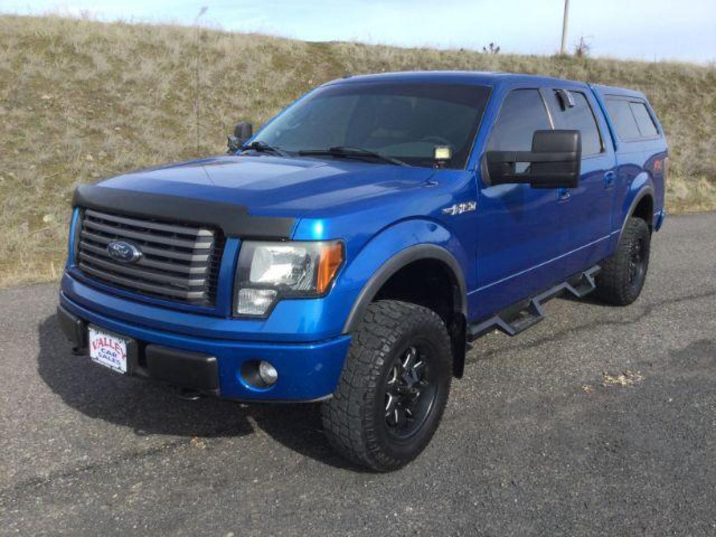 2012 Blue Flame Metallic /Black Leather Interior Ford F-150 FX4 SuperCrew 5.5-ft. Bed 4WD (1FTFW1EF9CF) with an 5.0L V8 engine, 6-Speed Automatic transmission, located at 1801 Main Street, Lewiston, 83501, (208) 743-9371, 46.417065, -117.004799 - Photo#0