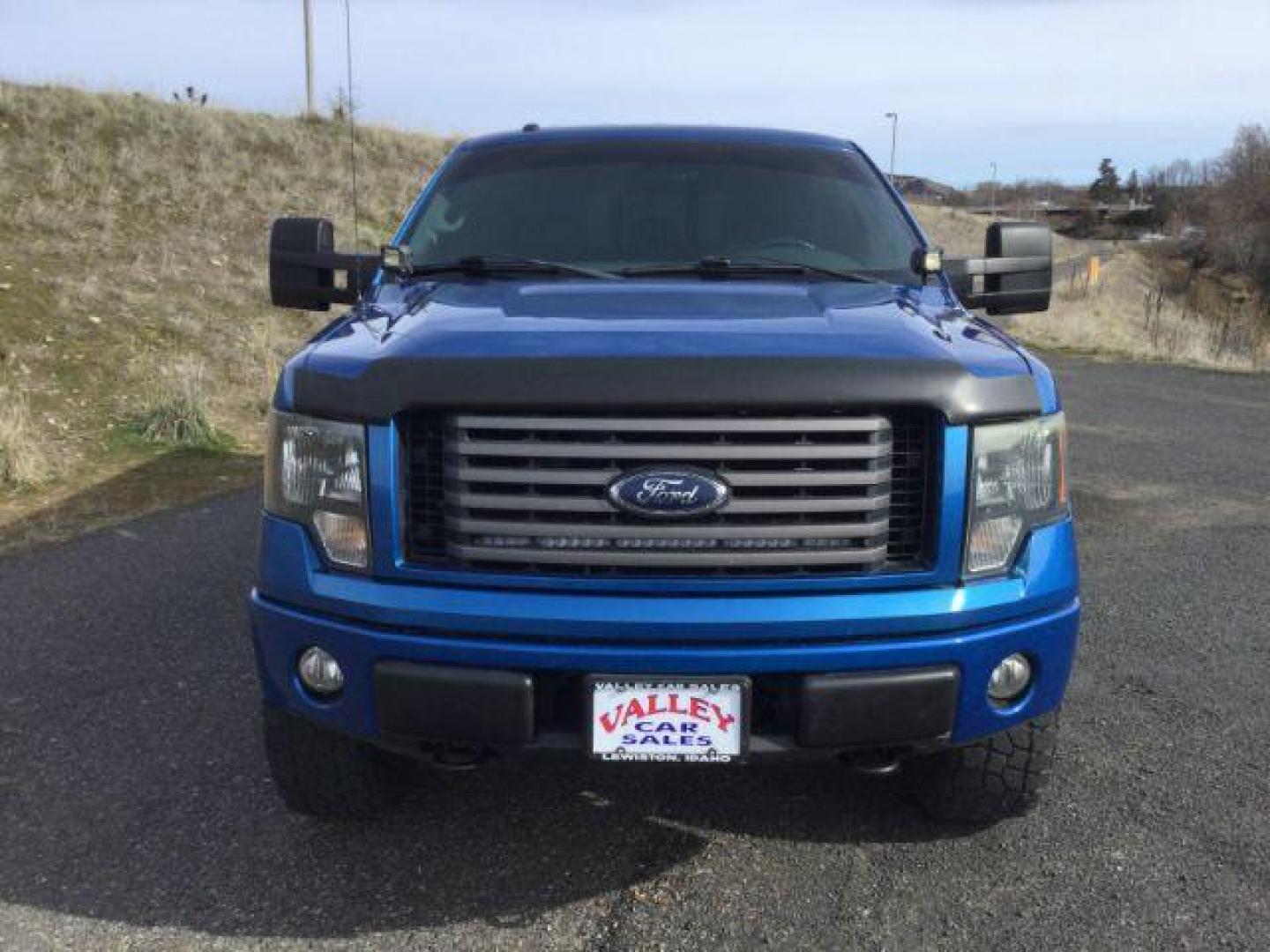 2012 Blue Flame Metallic /Black Leather Interior Ford F-150 FX4 SuperCrew 5.5-ft. Bed 4WD (1FTFW1EF9CF) with an 5.0L V8 engine, 6-Speed Automatic transmission, located at 1801 Main Street, Lewiston, 83501, (208) 743-9371, 46.417065, -117.004799 - Photo#11