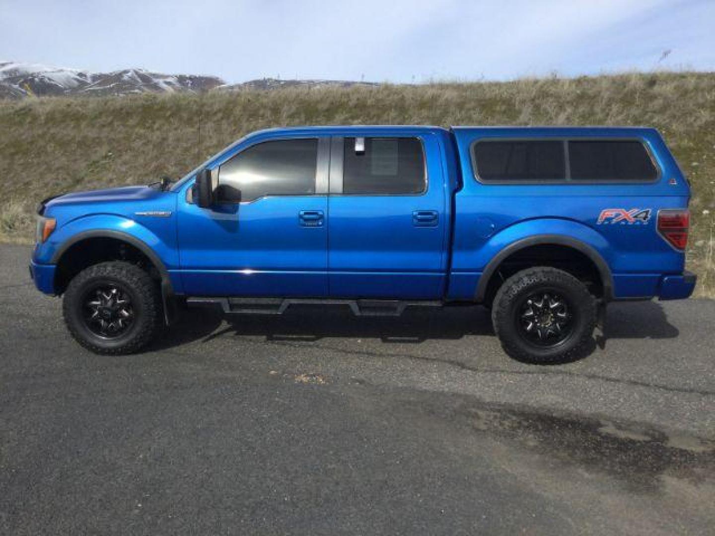 2012 Blue Flame Metallic /Black Leather Interior Ford F-150 FX4 SuperCrew 5.5-ft. Bed 4WD (1FTFW1EF9CF) with an 5.0L V8 engine, 6-Speed Automatic transmission, located at 1801 Main Street, Lewiston, 83501, (208) 743-9371, 46.417065, -117.004799 - Photo#1