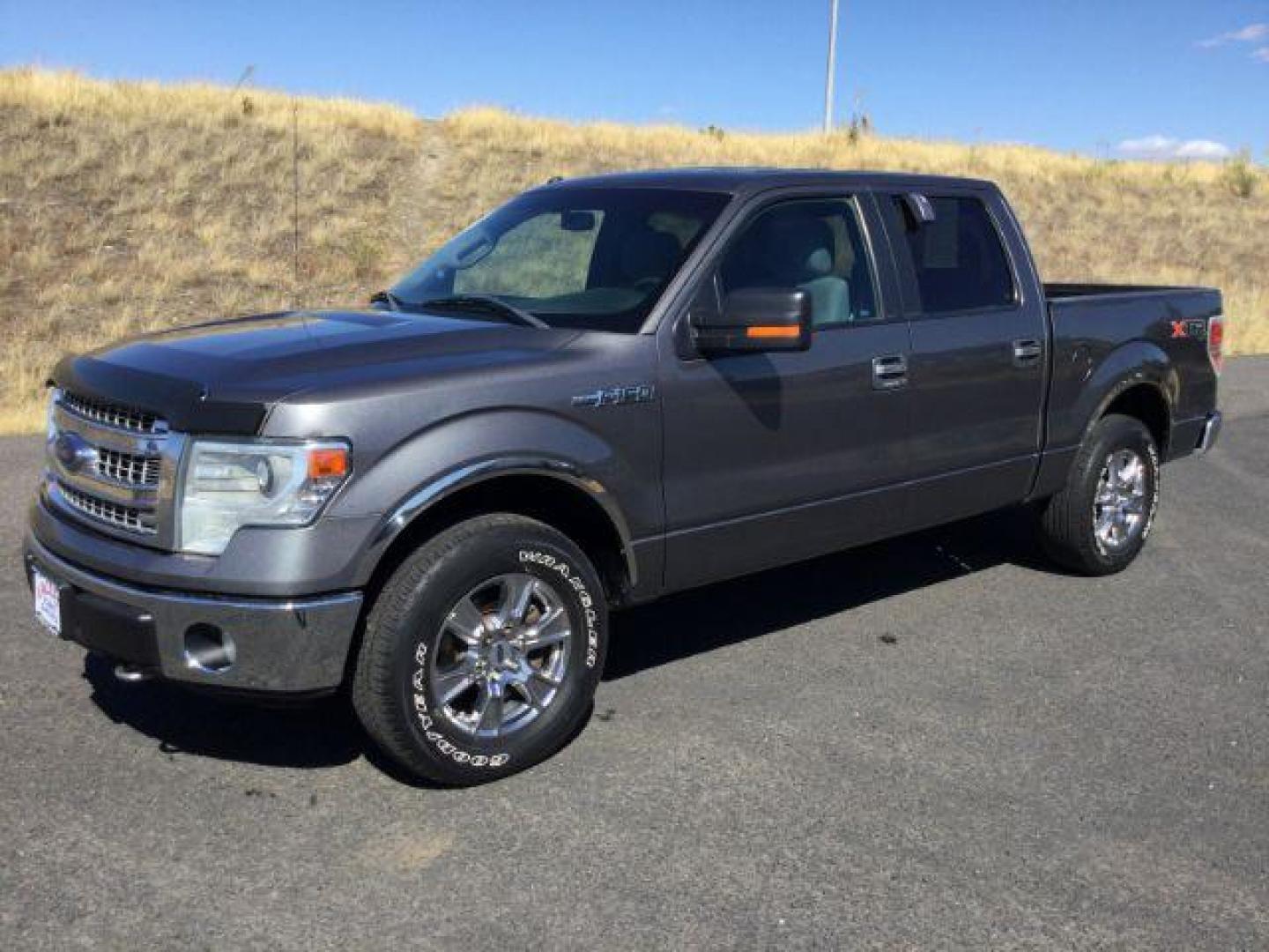 2014 Sterling Gray Metallic /Steel Gray Ford F-150 XLT SuperCrew 5.5-ft. Bed 4WD (1FTFW1EF8EF) with an 5.0L V8 engine, 6-Speed Automatic transmission, located at 1801 Main Street, Lewiston, 83501, (208) 743-9371, 46.417065, -117.004799 - Photo#0