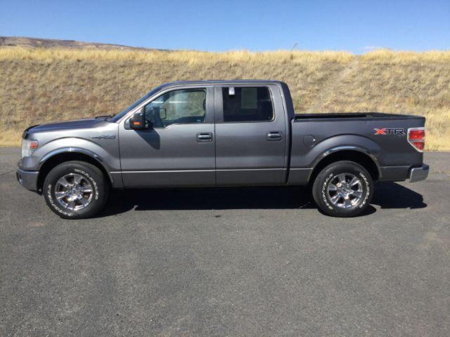 2014 Sterling Gray Metallic /Steel Gray Ford F-150 XLT SuperCrew 5.5-ft. Bed 4WD (1FTFW1EF8EF) with an 5.0L V8 engine, 6-Speed Automatic transmission, located at 1801 Main Street, Lewiston, 83501, (208) 743-9371, 46.417065, -117.004799 - Photo#1