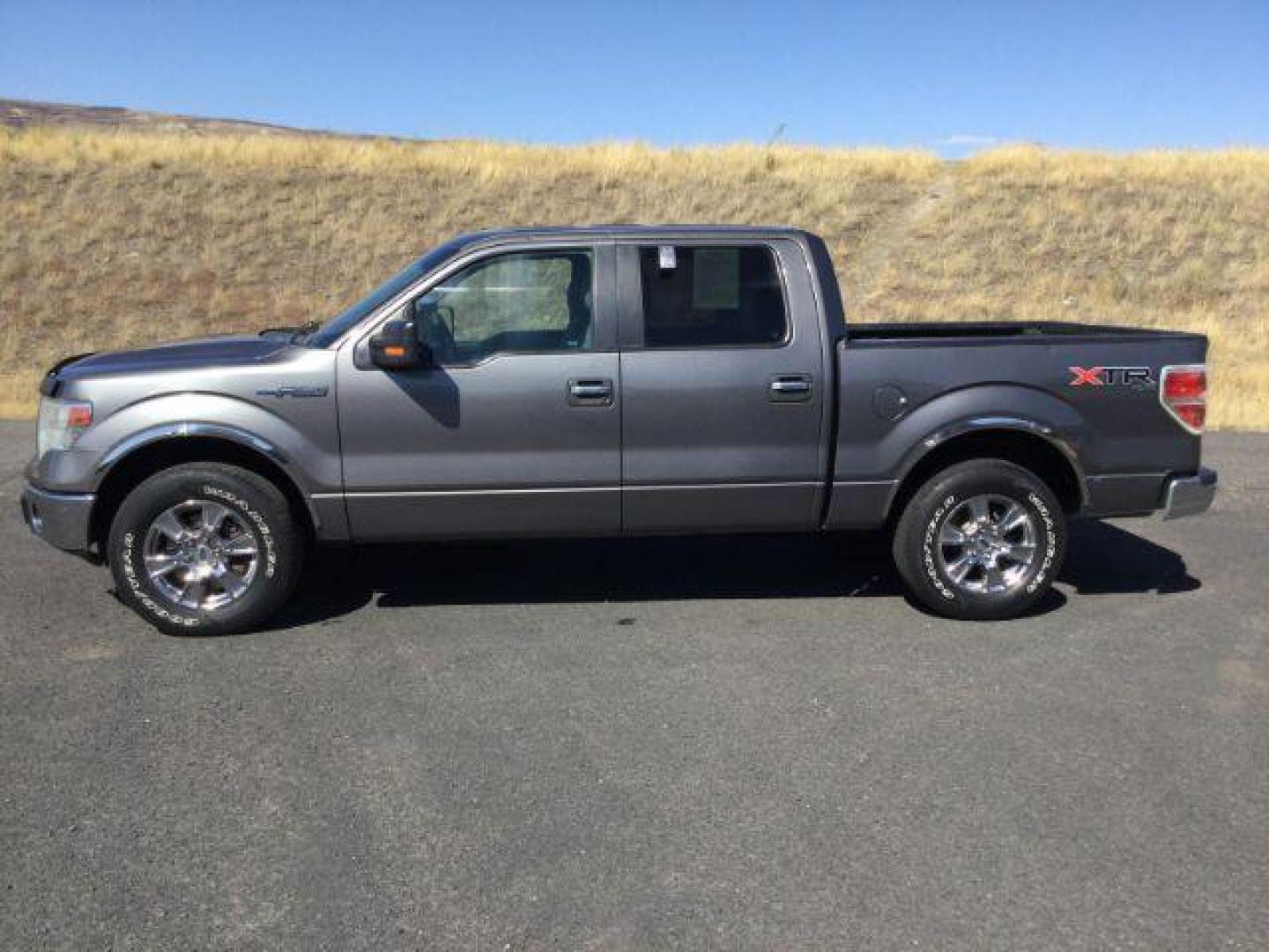 2014 Sterling Gray Metallic /Steel Gray Ford F-150 XLT SuperCrew 5.5-ft. Bed 4WD (1FTFW1EF8EF) with an 5.0L V8 engine, 6-Speed Automatic transmission, located at 1801 Main Street, Lewiston, 83501, (208) 743-9371, 46.417065, -117.004799 - Photo#2