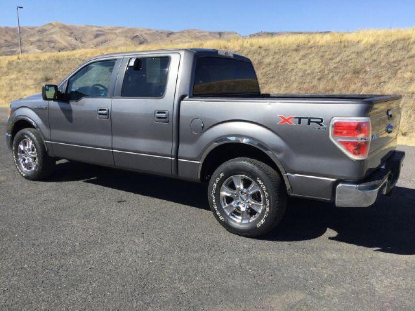 2014 Sterling Gray Metallic /Steel Gray Ford F-150 XLT SuperCrew 5.5-ft. Bed 4WD (1FTFW1EF8EF) with an 5.0L V8 engine, 6-Speed Automatic transmission, located at 1801 Main Street, Lewiston, 83501, (208) 743-9371, 46.417065, -117.004799 - Photo#3