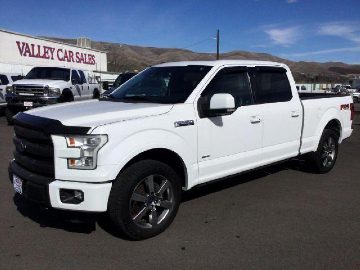 2015 Oxford White /black leather Ford F-150 Lariat SuperCrew 6.5-ft. Bed 4WD (1FTFW1EG7FF) with an 3.5 V6 engine, 6-Speed Automatic transmission, located at 1801 Main Street, Lewiston, 83501, (208) 743-9371, 46.417065, -117.004799 - Photo#0