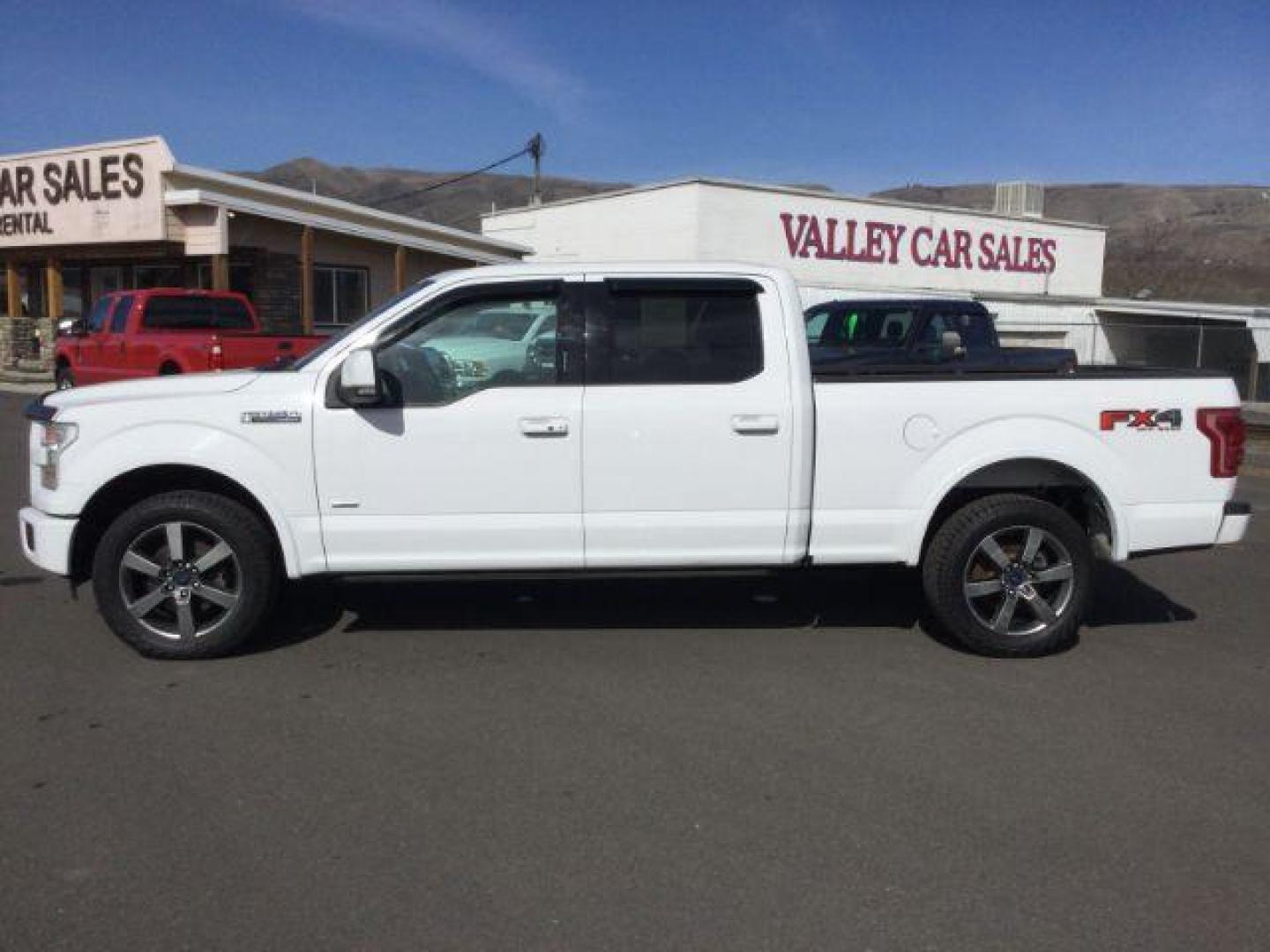 2015 Oxford White /black leather Ford F-150 Lariat SuperCrew 6.5-ft. Bed 4WD (1FTFW1EG7FF) with an 3.5 V6 engine, 6-Speed Automatic transmission, located at 1801 Main Street, Lewiston, 83501, (208) 743-9371, 46.417065, -117.004799 - Photo#1