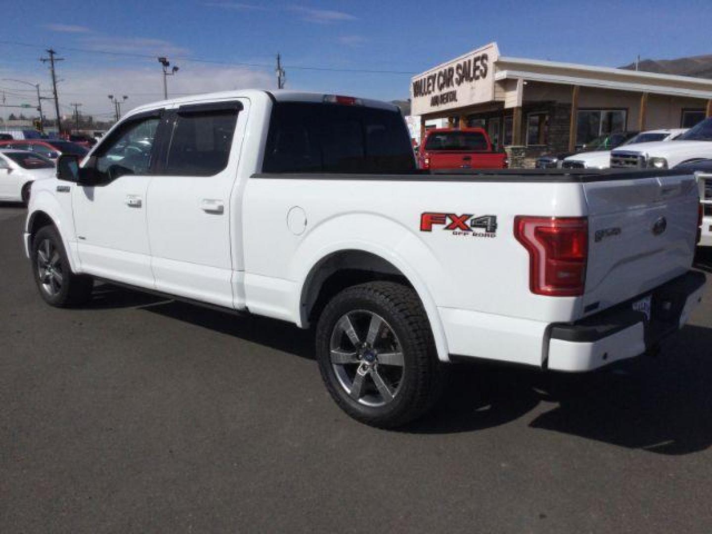 2015 Oxford White /black leather Ford F-150 Lariat SuperCrew 6.5-ft. Bed 4WD (1FTFW1EG7FF) with an 3.5 V6 engine, 6-Speed Automatic transmission, located at 1801 Main Street, Lewiston, 83501, (208) 743-9371, 46.417065, -117.004799 - Photo#2