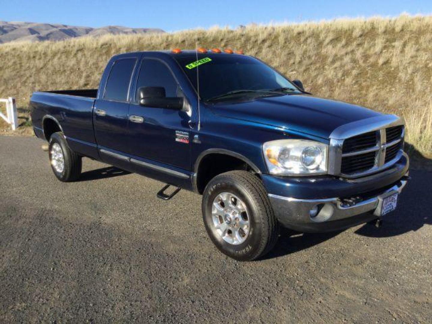 2007 Patriot Blue Pearlcoat /Medium Slate Gray Cloth Interior Dodge Ram 3500 SLT Quad Cab LWB 4X4 (3D7MX38C57G) with an 5.9L L6 OHV 24V TURBO DIESEL engine, 6-Speed Manual transmission, located at 1801 Main Street, Lewiston, 83501, (208) 743-9371, 46.417065, -117.004799 - Photo#12