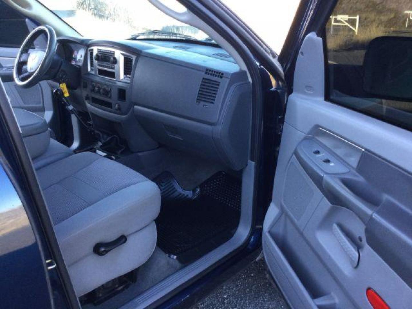 2007 Patriot Blue Pearlcoat /Medium Slate Gray Cloth Interior Dodge Ram 3500 SLT Quad Cab LWB 4X4 (3D7MX38C57G) with an 5.9L L6 OHV 24V TURBO DIESEL engine, 6-Speed Manual transmission, located at 1801 Main Street, Lewiston, 83501, (208) 743-9371, 46.417065, -117.004799 - Photo#19