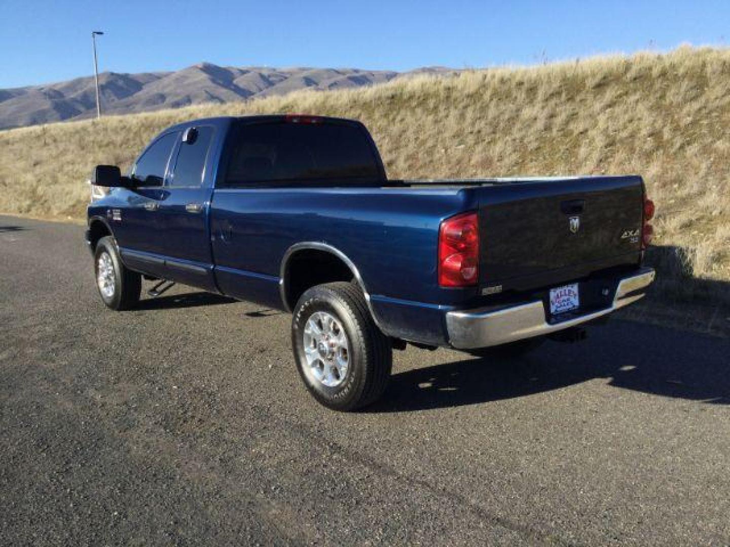 2007 Patriot Blue Pearlcoat /Medium Slate Gray Cloth Interior Dodge Ram 3500 SLT Quad Cab LWB 4X4 (3D7MX38C57G) with an 5.9L L6 OHV 24V TURBO DIESEL engine, 6-Speed Manual transmission, located at 1801 Main Street, Lewiston, 83501, (208) 743-9371, 46.417065, -117.004799 - Photo#2