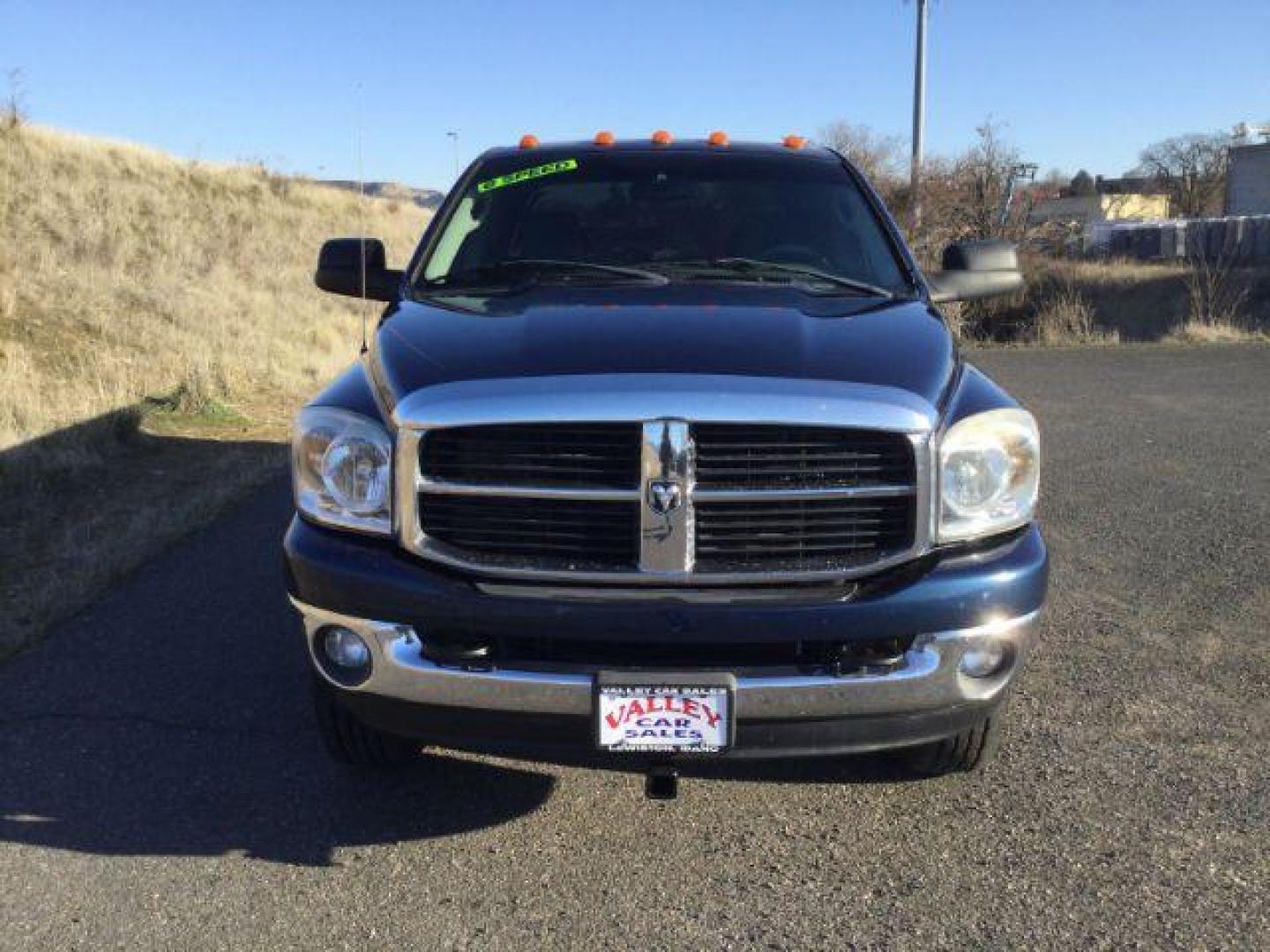 2007 Patriot Blue Pearlcoat /Medium Slate Gray Cloth Interior Dodge Ram 3500 SLT Quad Cab LWB 4X4 (3D7MX38C57G) with an 5.9L L6 OHV 24V TURBO DIESEL engine, 6-Speed Manual transmission, located at 1801 Main Street, Lewiston, 83501, (208) 743-9371, 46.417065, -117.004799 - Photo#7