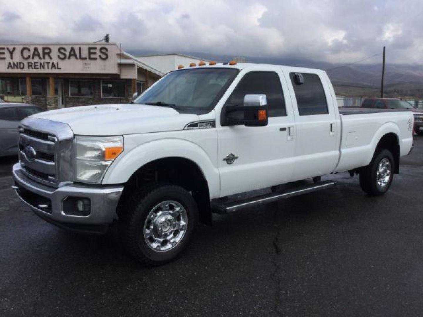 2014 Oxford White /BLACK LEATHER Ford F-350 SD Lariat Crew Cab Long Bed 4WD (1FT8W3BT2EE) with an 6.7L V8 OHV 16V DIESEL engine, 6-Speed Automatic transmission, located at 1801 Main Street, Lewiston, 83501, (208) 743-9371, 46.417065, -117.004799 - Photo#0