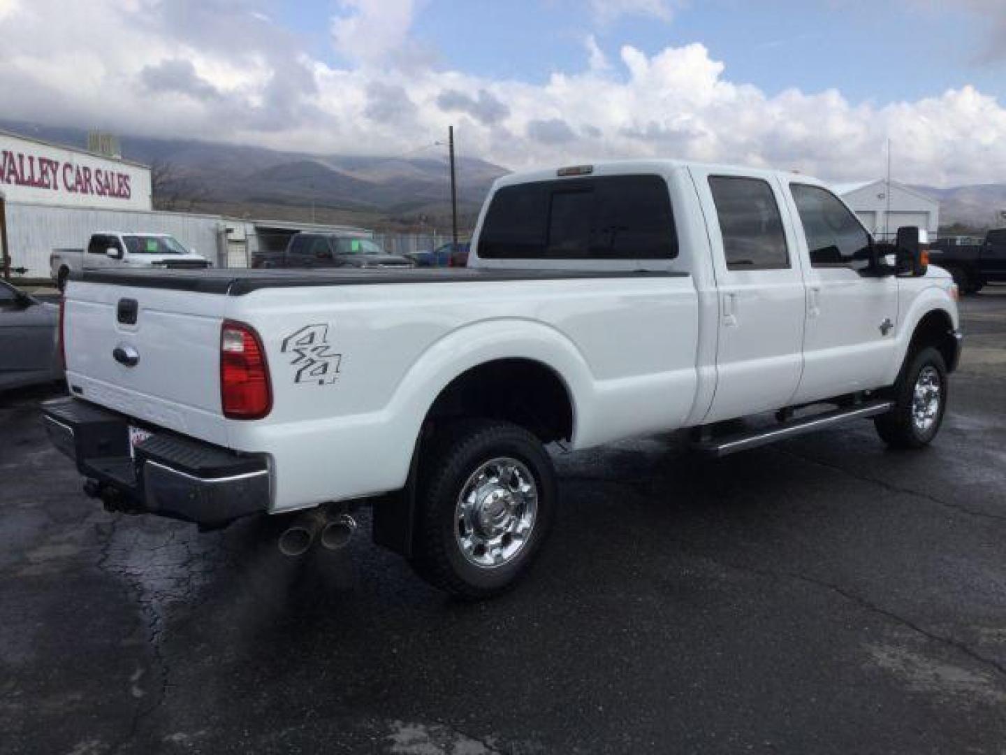 2014 Oxford White /BLACK LEATHER Ford F-350 SD Lariat Crew Cab Long Bed 4WD (1FT8W3BT2EE) with an 6.7L V8 OHV 16V DIESEL engine, 6-Speed Automatic transmission, located at 1801 Main Street, Lewiston, 83501, (208) 743-9371, 46.417065, -117.004799 - Photo#12