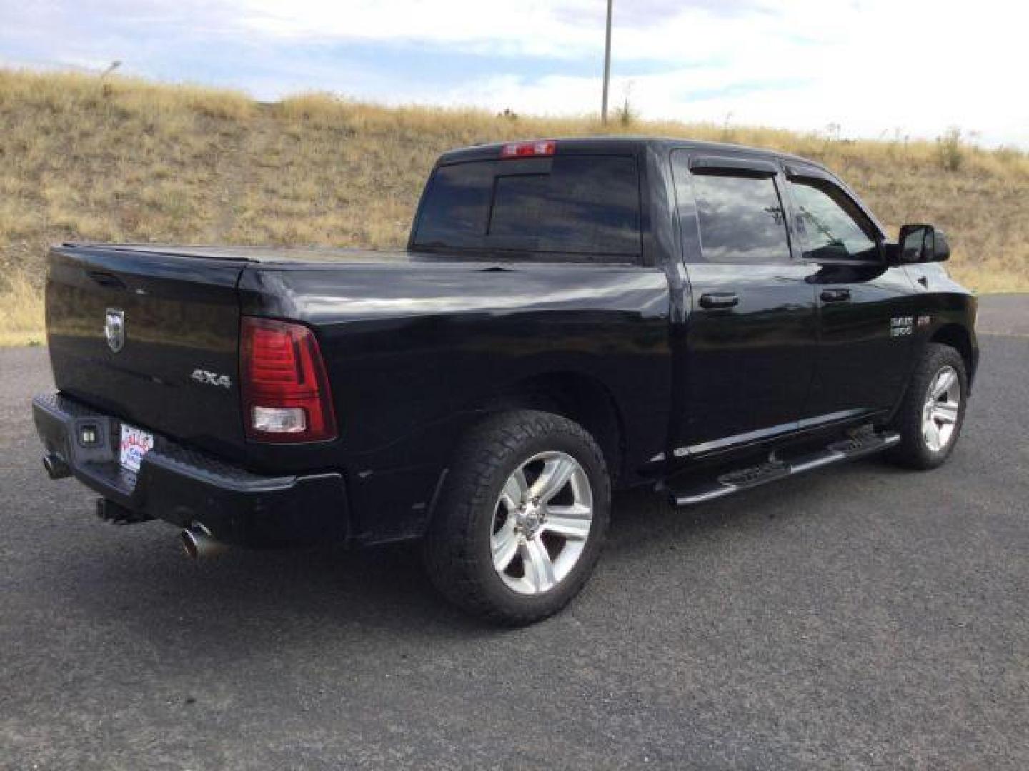 2014 Black Clearcoat /Black RAM 1500 Sport Crew Cab SWB 4WD (1C6RR7MT4ES) with an 5.7L V8 OHV 16V engine, 8-Speed Automatic transmission, located at 1801 Main Street, Lewiston, 83501, (208) 743-9371, 46.417065, -117.004799 - Photo#10