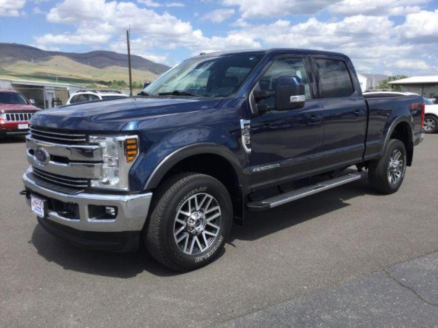 2018 Blue Jeans Metallic/Magnetic Metallic /Black, leather Ford F-350 SD Lariat Crew Cab 4WD (1FT8W3BT0JE) with an 6.7L V8 OHV 16V DIESEL engine, 6-Speed Automatic transmission, located at 1801 Main Street, Lewiston, 83501, (208) 743-9371, 46.417065, -117.004799 - Photo#0