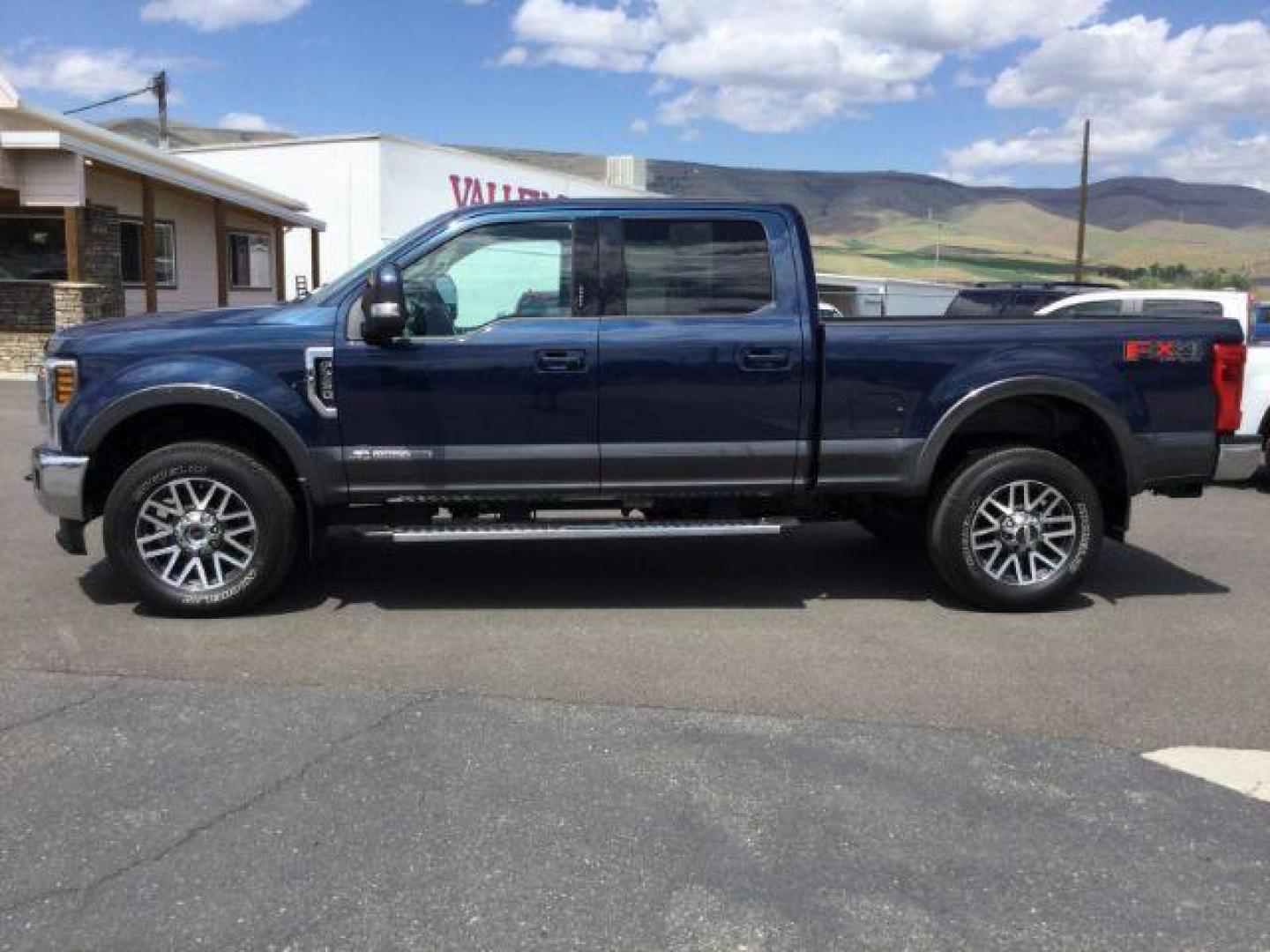 2018 Blue Jeans Metallic/Magnetic Metallic /Black, leather Ford F-350 SD Lariat Crew Cab 4WD (1FT8W3BT0JE) with an 6.7L V8 OHV 16V DIESEL engine, 6-Speed Automatic transmission, located at 1801 Main Street, Lewiston, 83501, (208) 743-9371, 46.417065, -117.004799 - Photo#1