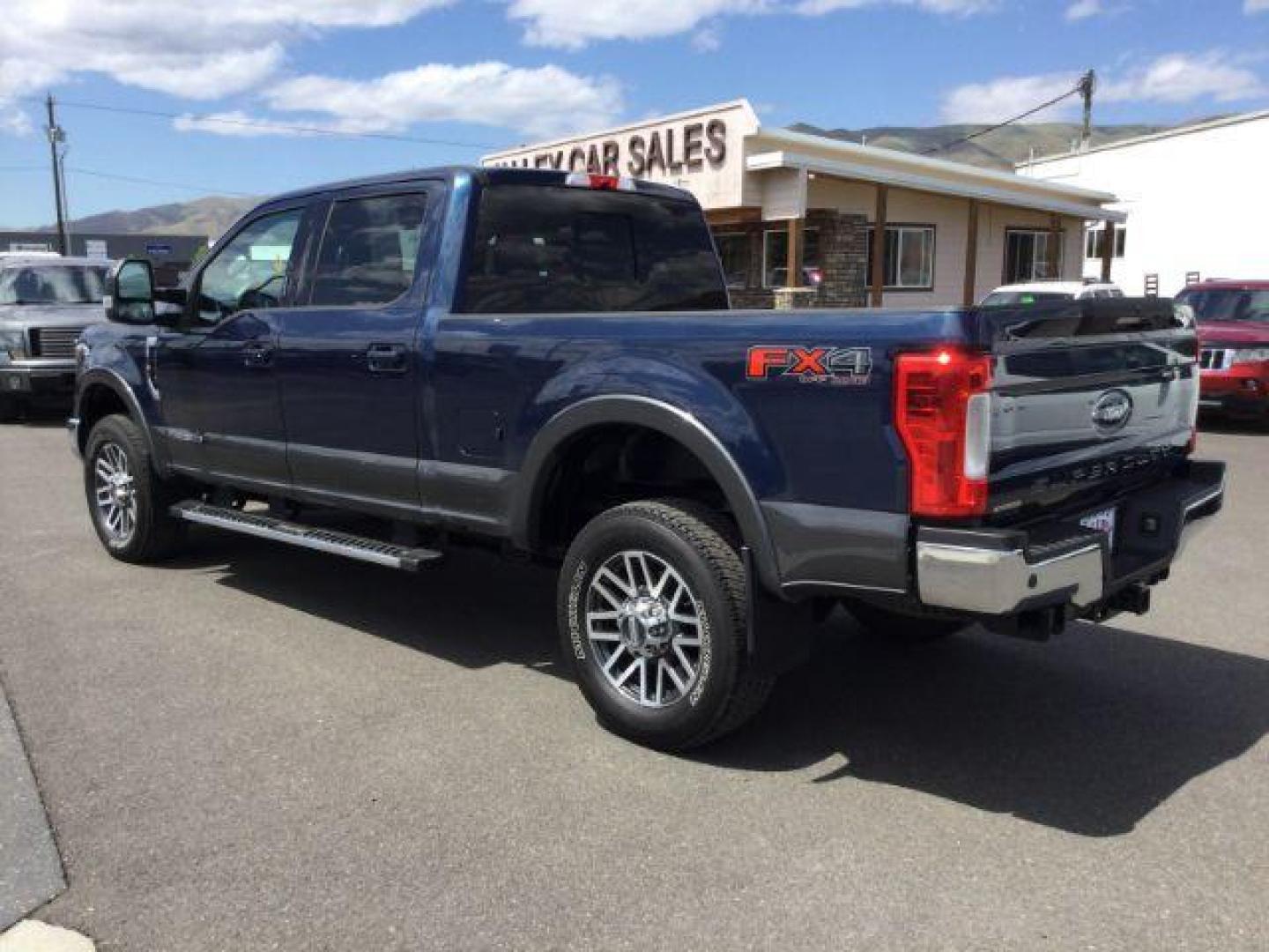 2018 Blue Jeans Metallic/Magnetic Metallic /Black, leather Ford F-350 SD Lariat Crew Cab 4WD (1FT8W3BT0JE) with an 6.7L V8 OHV 16V DIESEL engine, 6-Speed Automatic transmission, located at 1801 Main Street, Lewiston, 83501, (208) 743-9371, 46.417065, -117.004799 - Photo#2