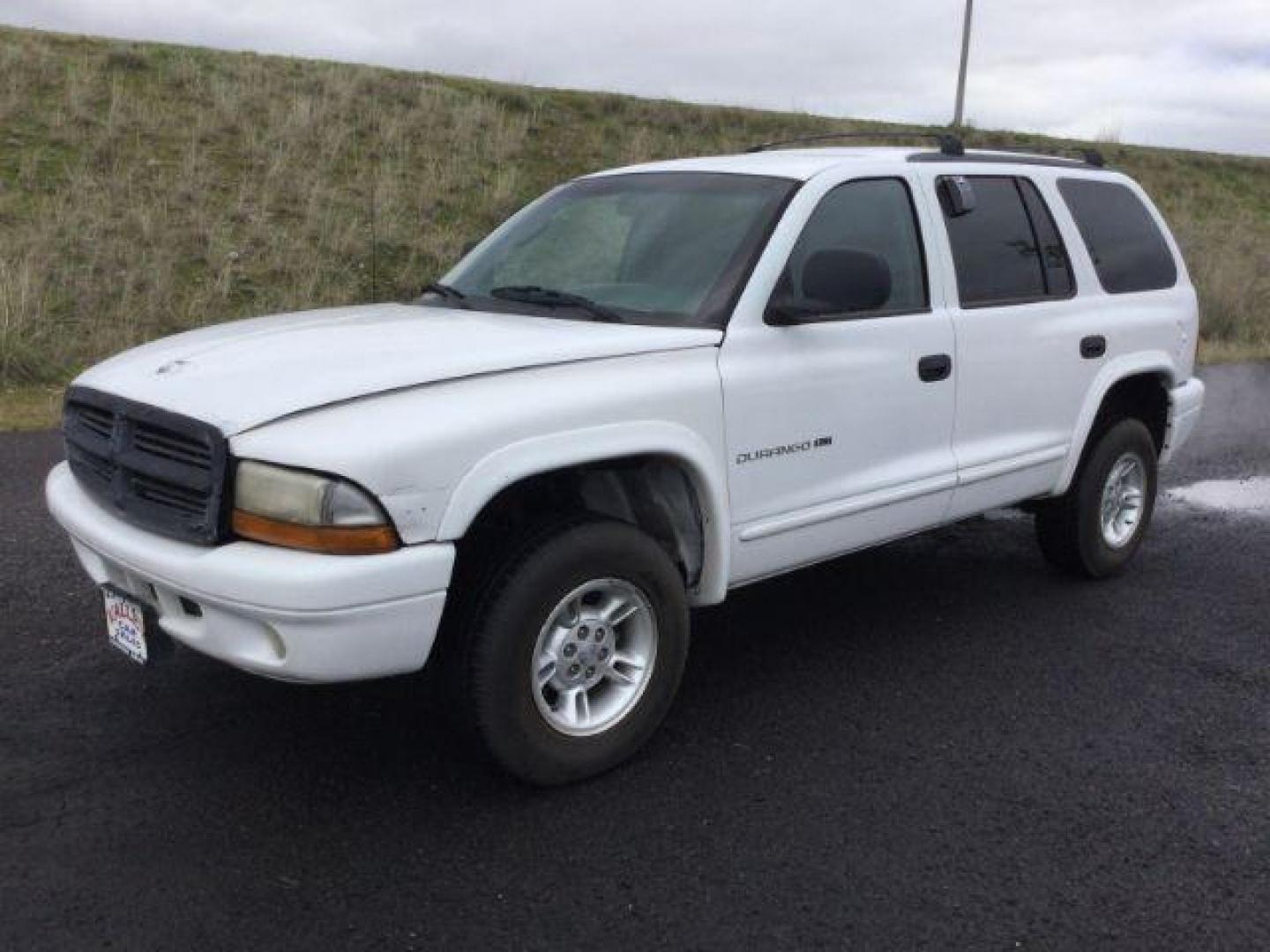 1999 Bright White Clear Coat /black leather Dodge Durango 4WD (1B4HS28Y6XF) with an 5.2L V8 OHV 16V engine, 4-Speed Automatic transmission, located at 1801 Main Street, Lewiston, 83501, (208) 743-9371, 46.417065, -117.004799 - Photo#13