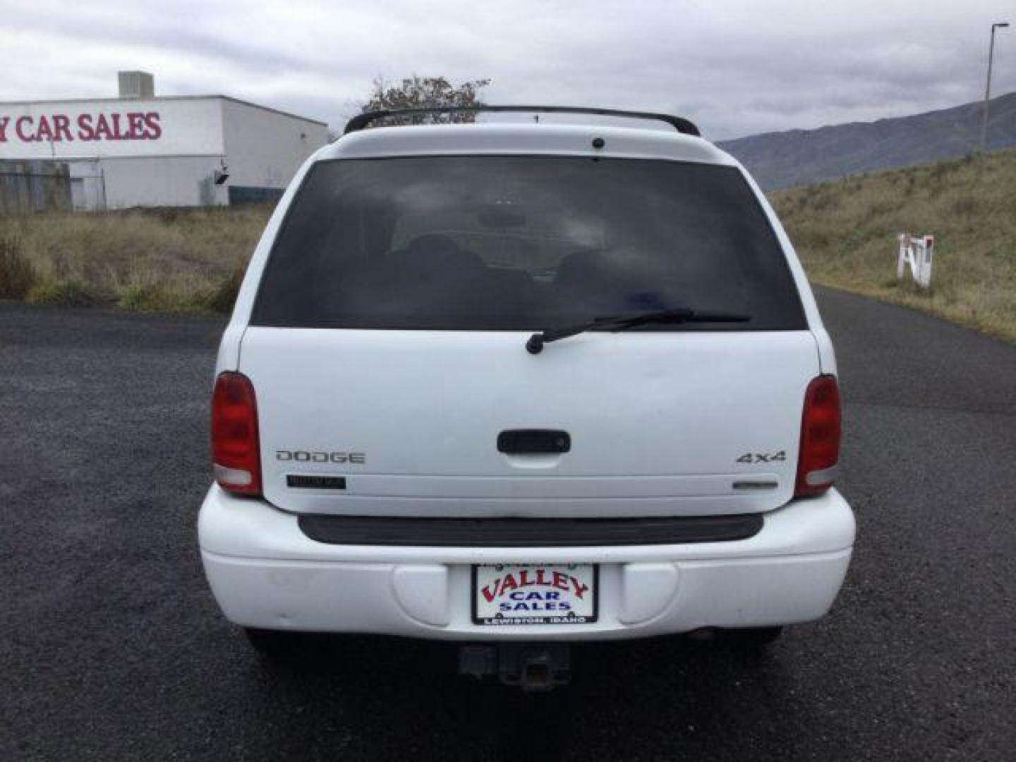 1999 Bright White Clear Coat /black leather Dodge Durango 4WD (1B4HS28Y6XF) with an 5.2L V8 OHV 16V engine, 4-Speed Automatic transmission, located at 1801 Main Street, Lewiston, 83501, (208) 743-9371, 46.417065, -117.004799 - Photo#8